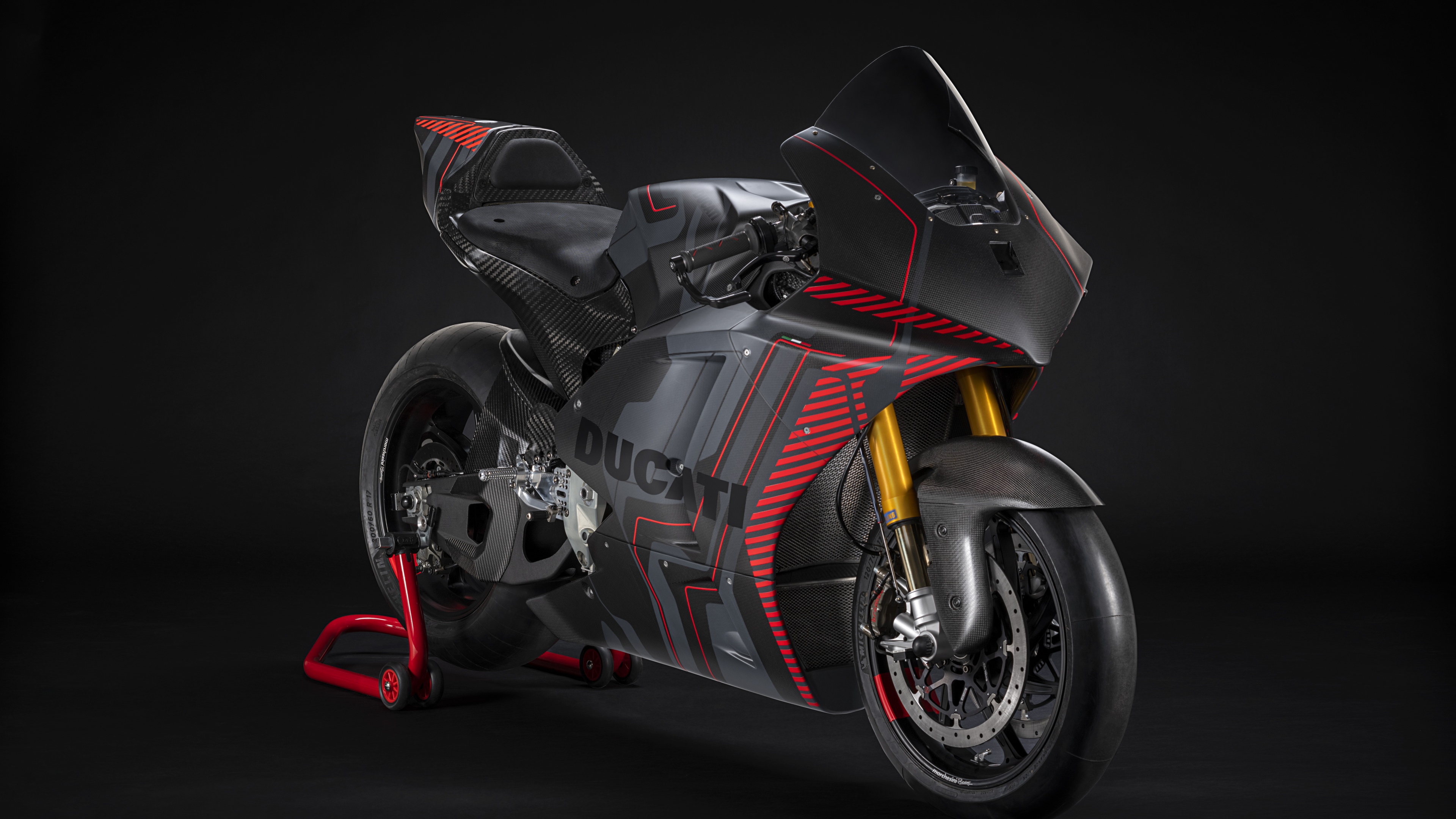 A high-detail Ducati sports motorcycle centered against a black background.