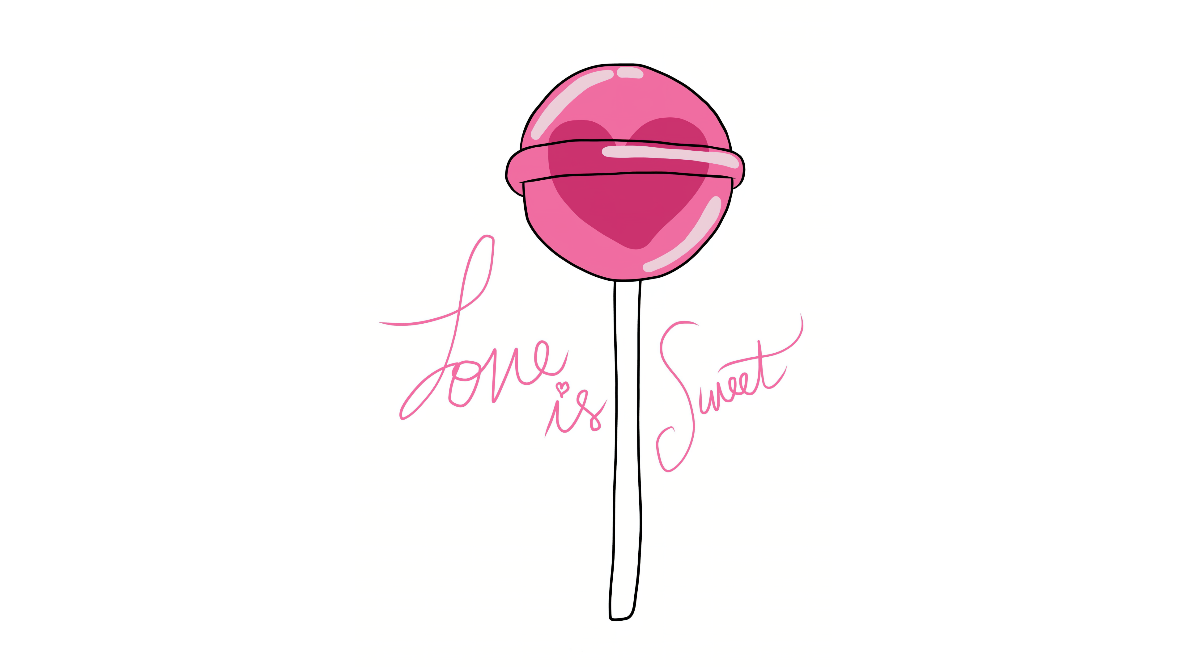 A glossy pink heart-shaped lollipop centered on a plain white background.