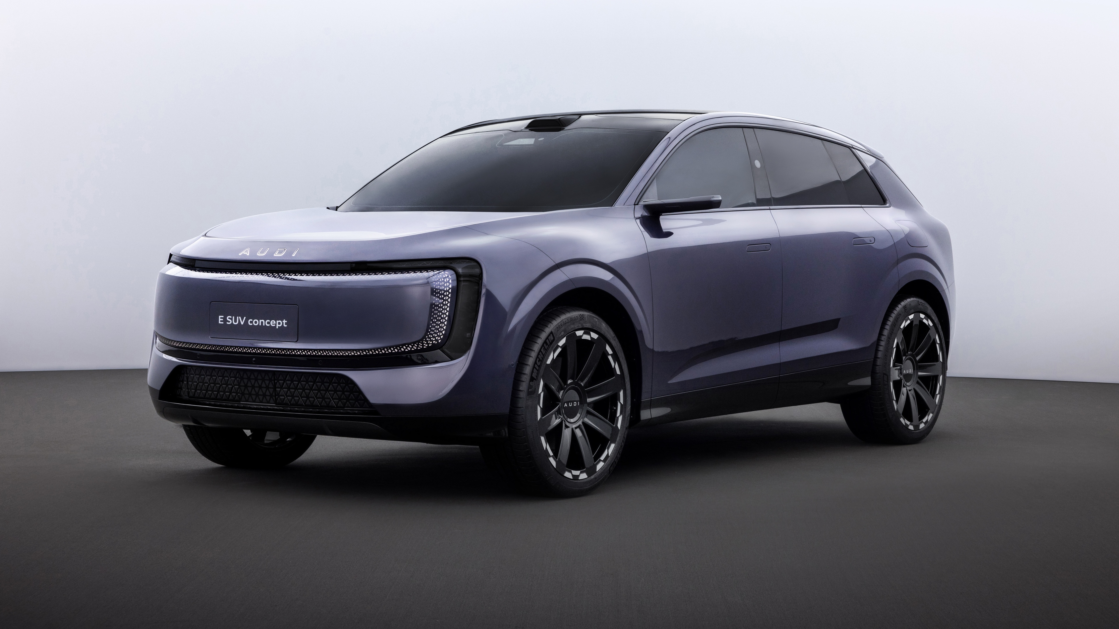 A futuristic concept car with streamlined bodywork and glowing LED accents, representing 2025 automotive design.