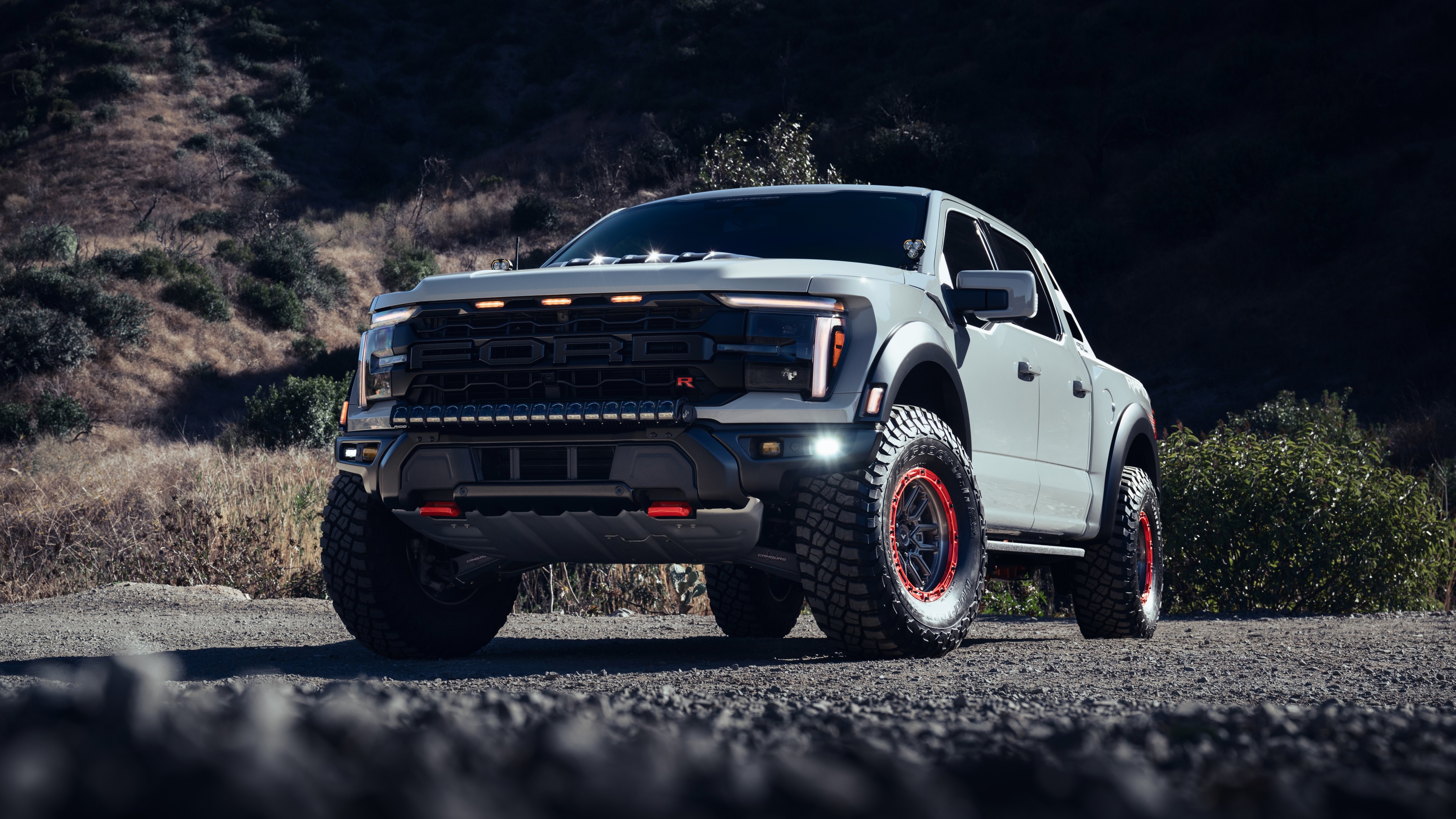 A heavily modified Ford F-150 Raptor with Vorsteiner styling elements, high-resolution automotive photography.