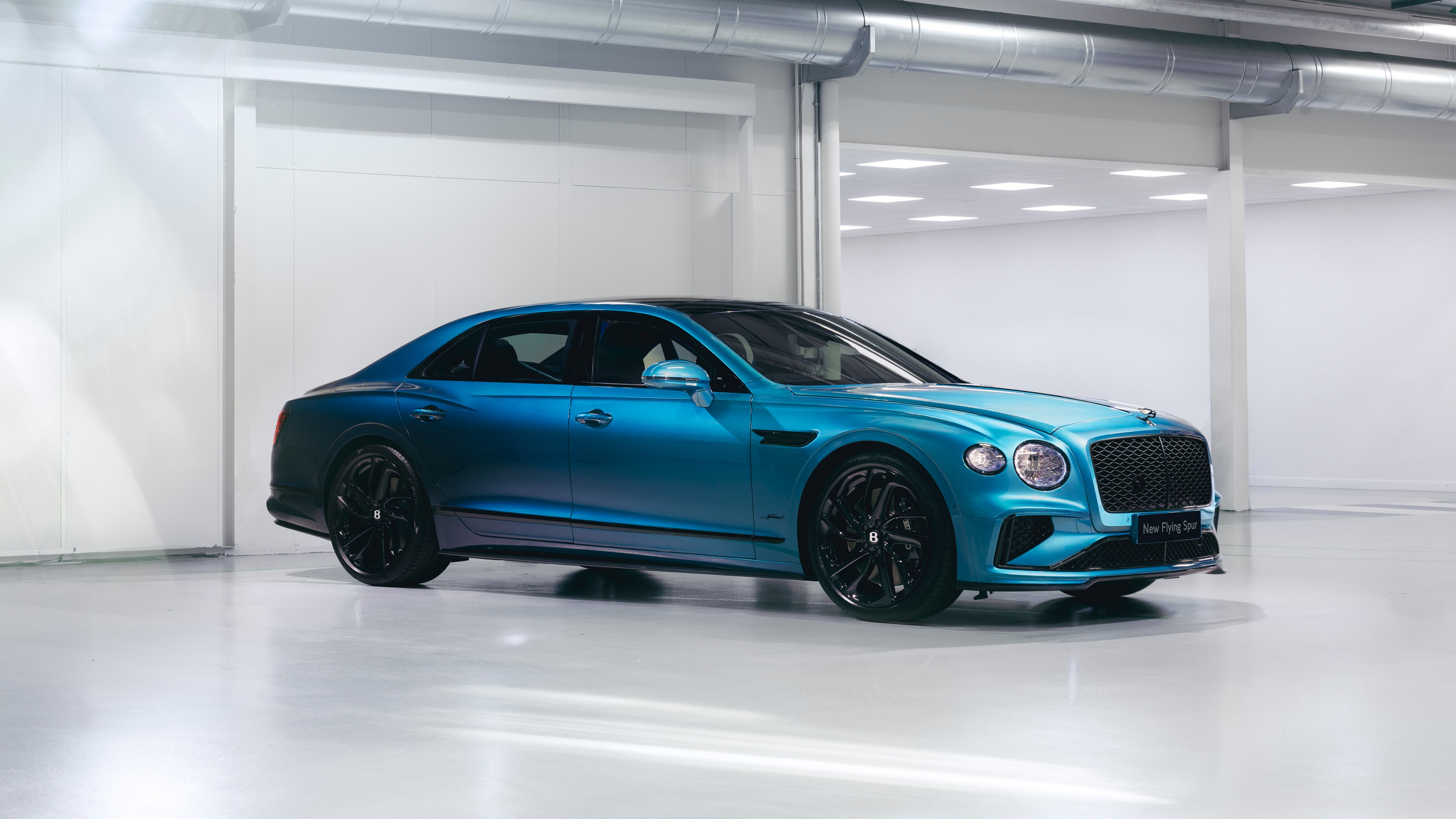 A detailed, high-resolution view of the 2025 Bentley Flying Spur Speed Mulliner edition, highlighting its luxurious finish and premium automotive styling.