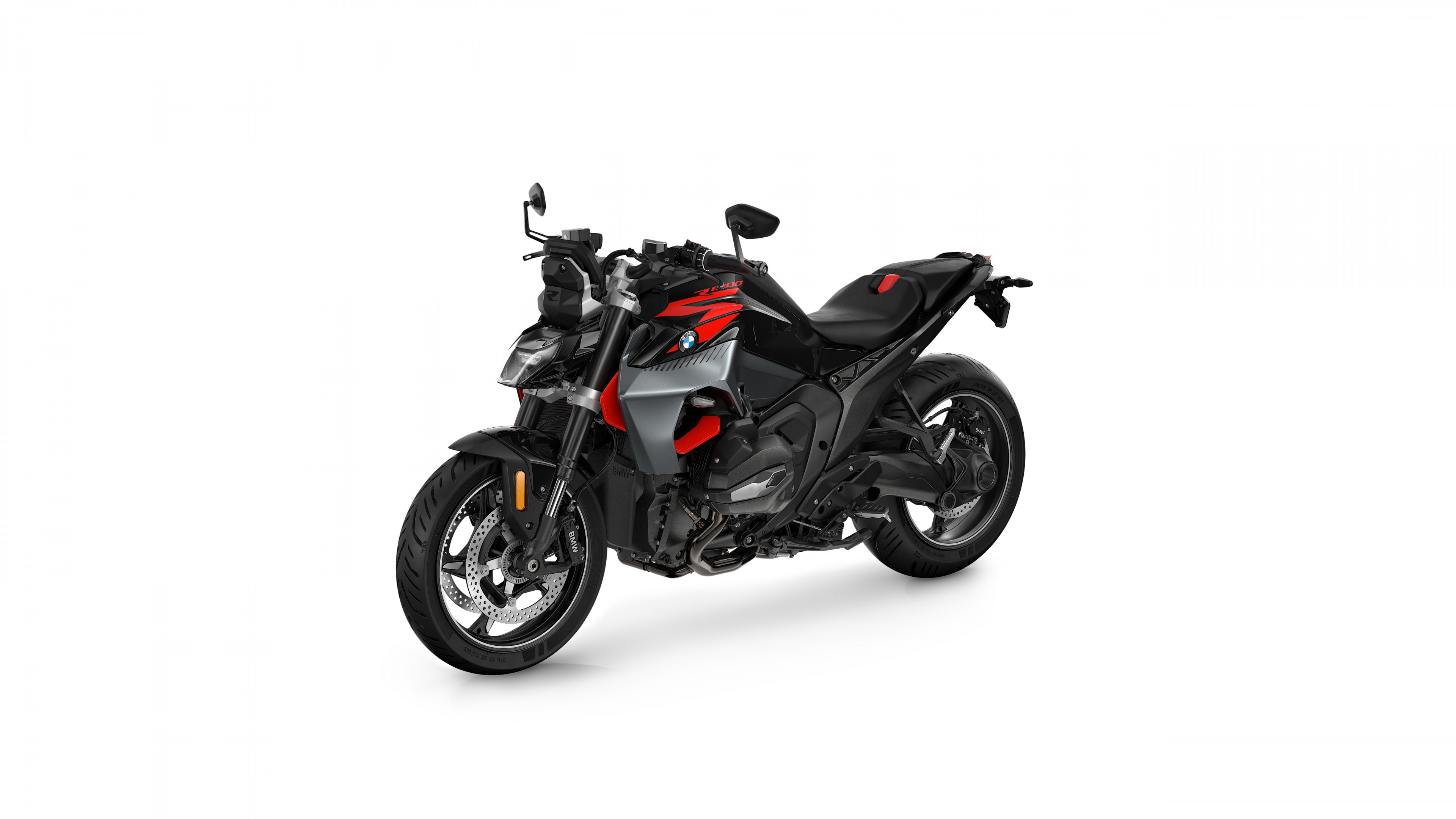 A professional studio shot of a 2025 BMW R 1300 R sports motorcycle with Option 719 Kilauea trim on a white background