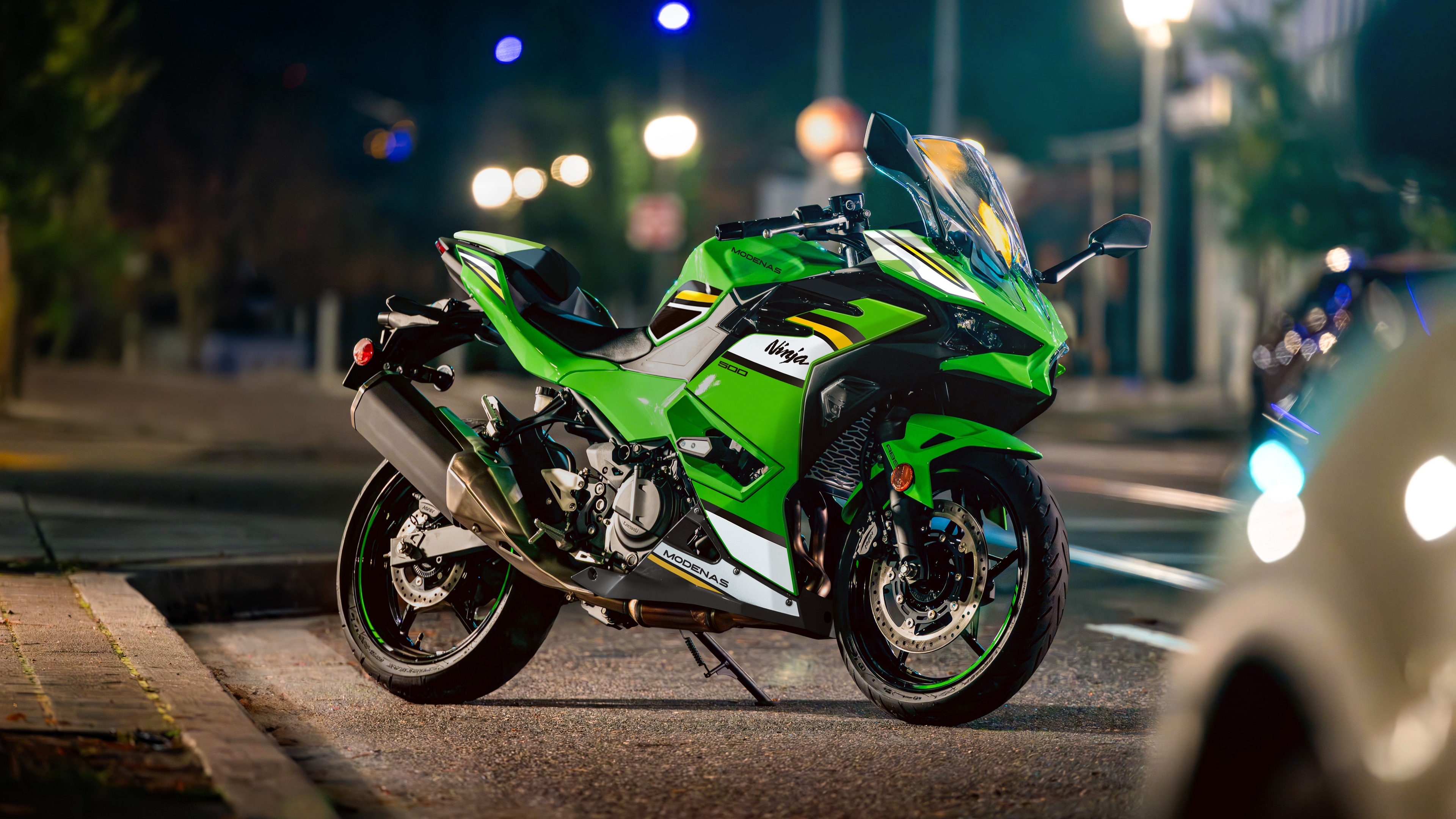 Detailed close-up of the 2025 Kawasaki Ninja 500 sport motorcycle featuring sleek aerodynamic design.
