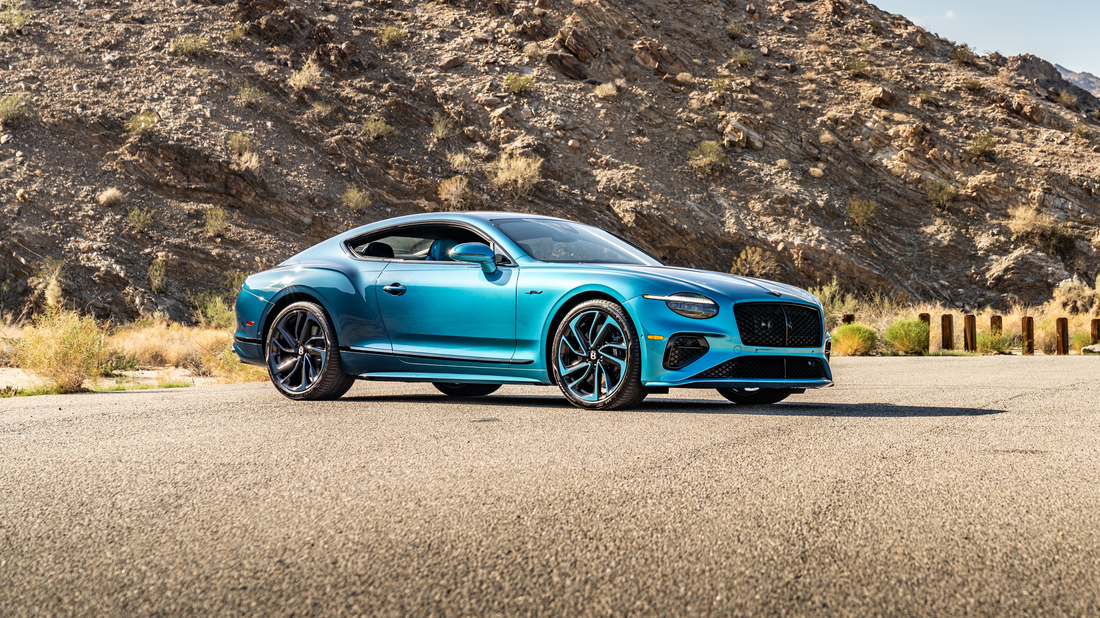 A high-resolution 5K close-up of a luxury bespoke vehicle featuring exquisite craftsmanship and elegant design elements.