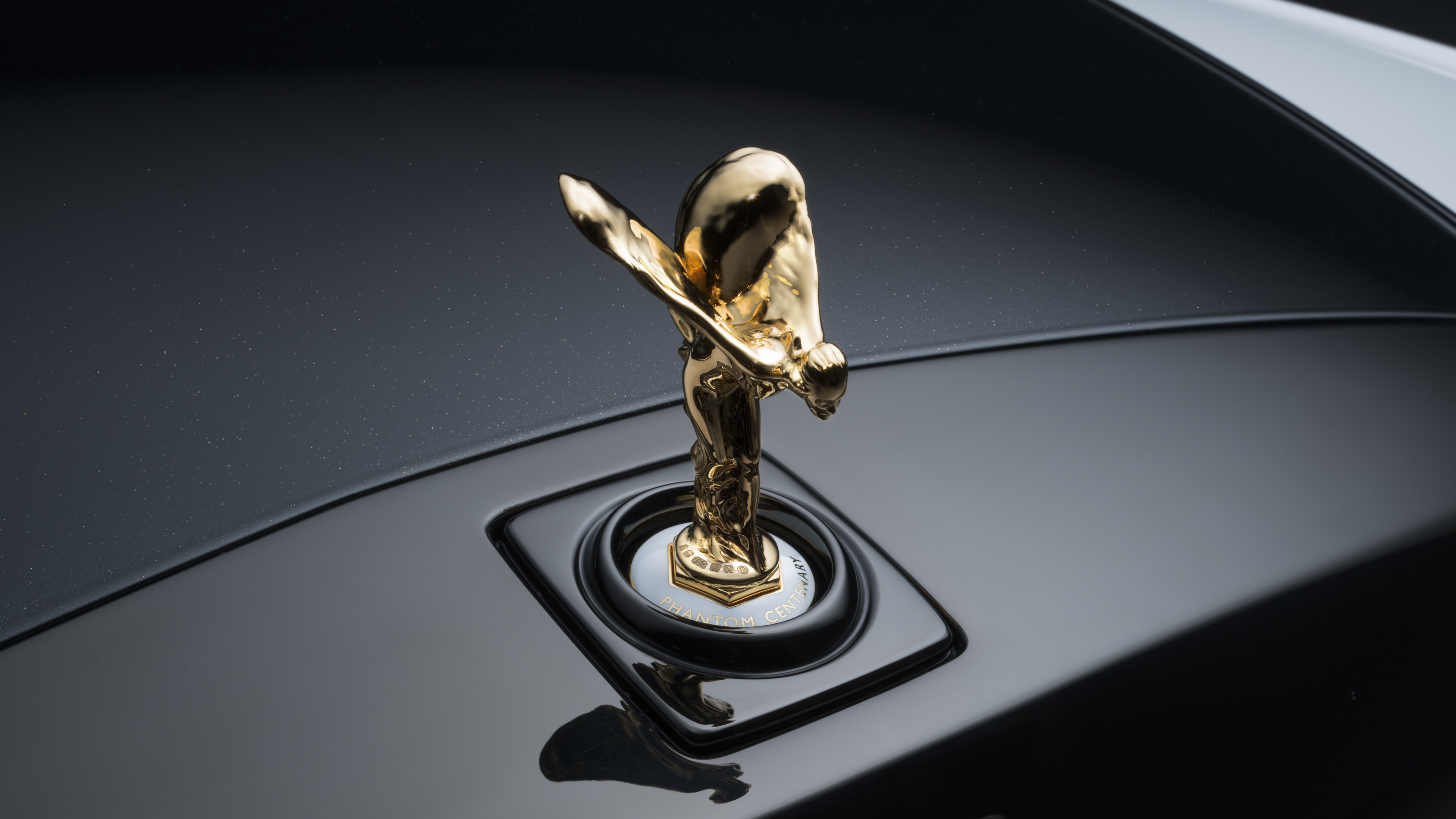 Close-up of the Spirit of Ecstasy ornament on a Rolls-Royce Phantom Centenary.
