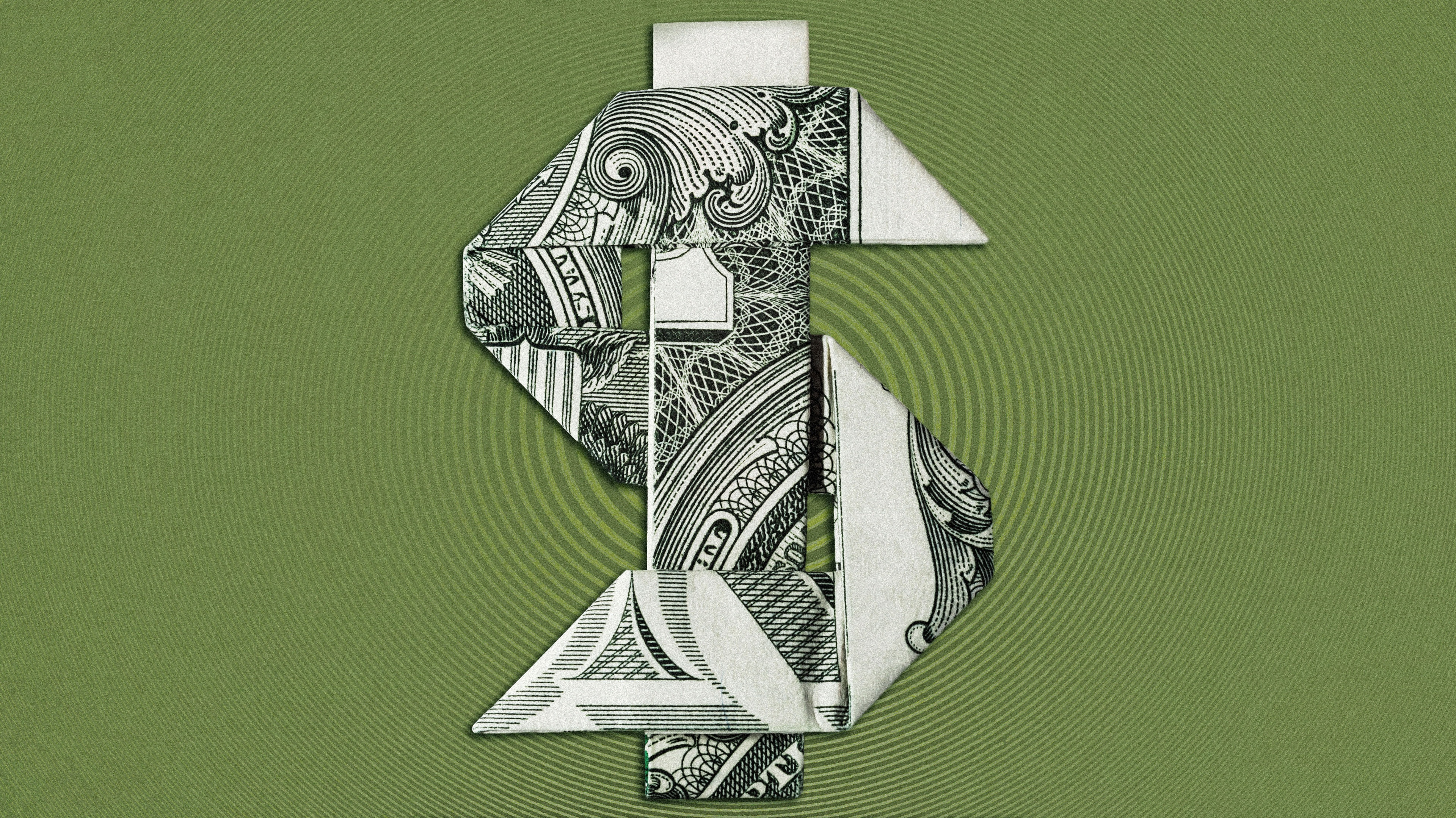 A detailed origami dollar bill folded from paper on a solid green background.