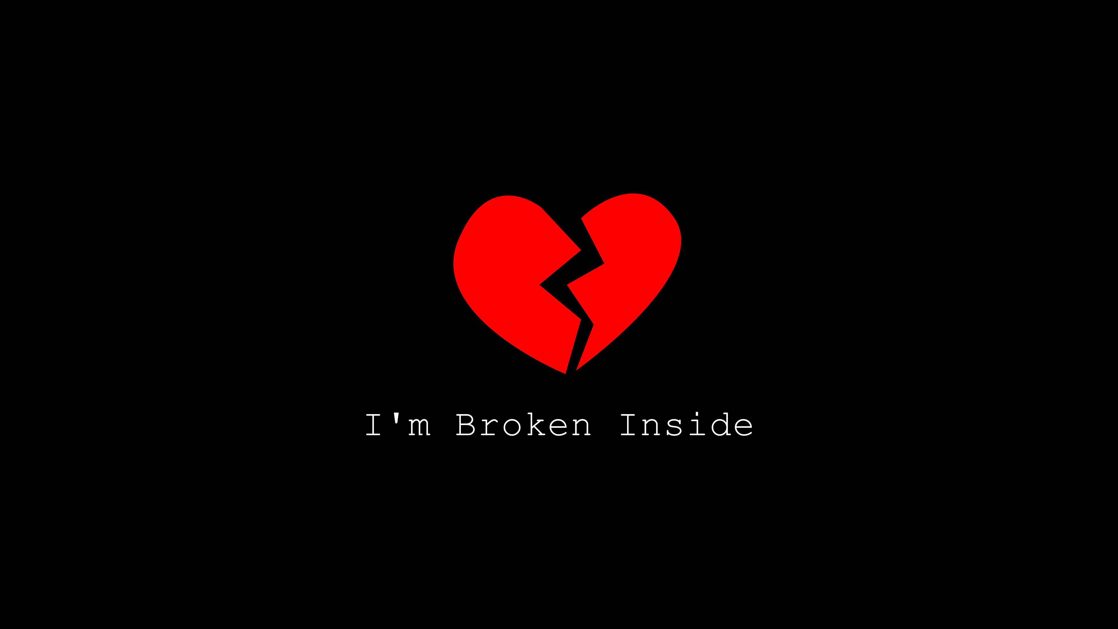 A minimalist visual of a cracked red heart centered on a pitch-black background, representing sorrow and heartbreak.