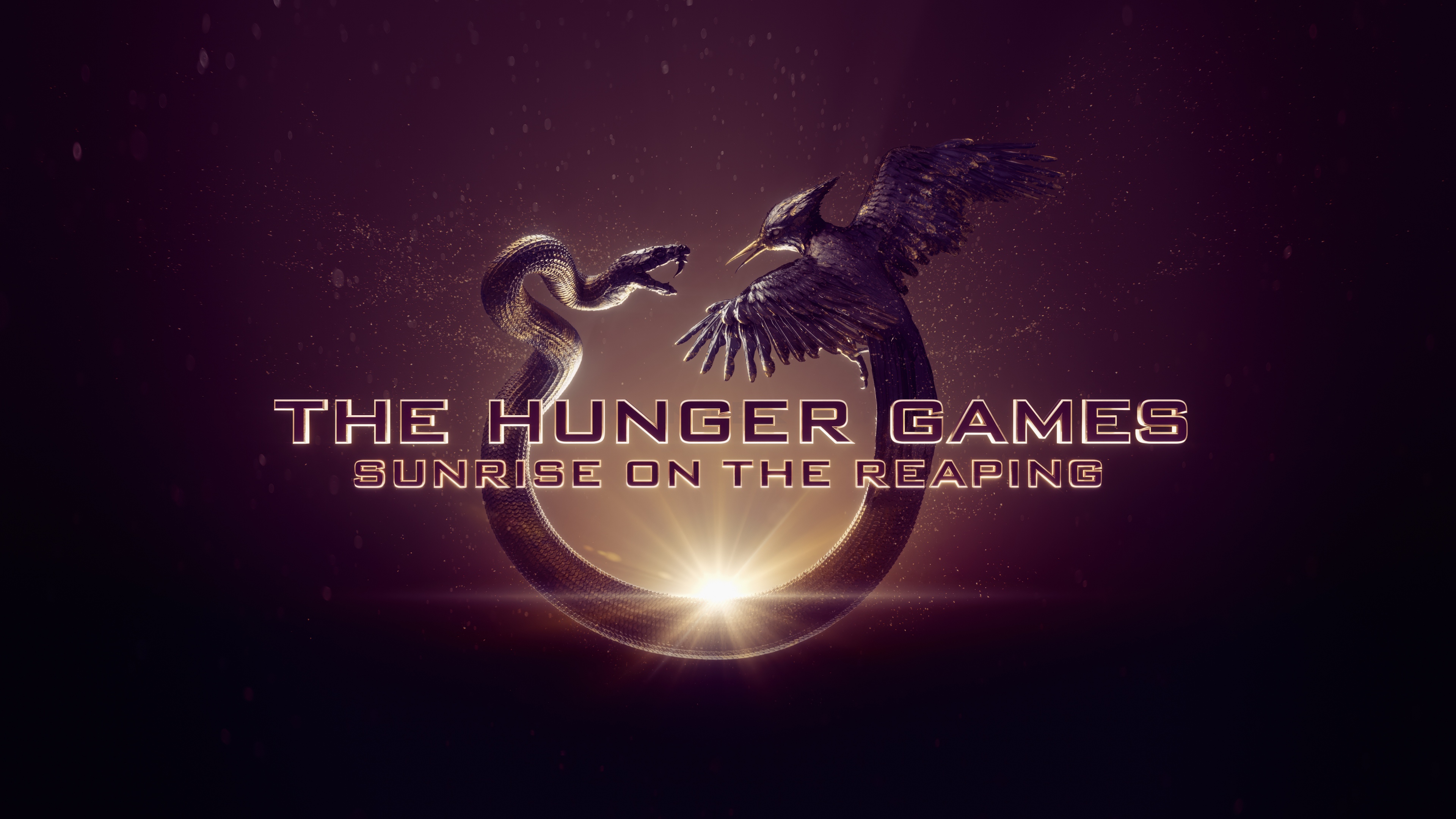 A dramatic cinematic sunrise over the arena landscape for The Hunger Games: Sunrise on the Reaping teaser.