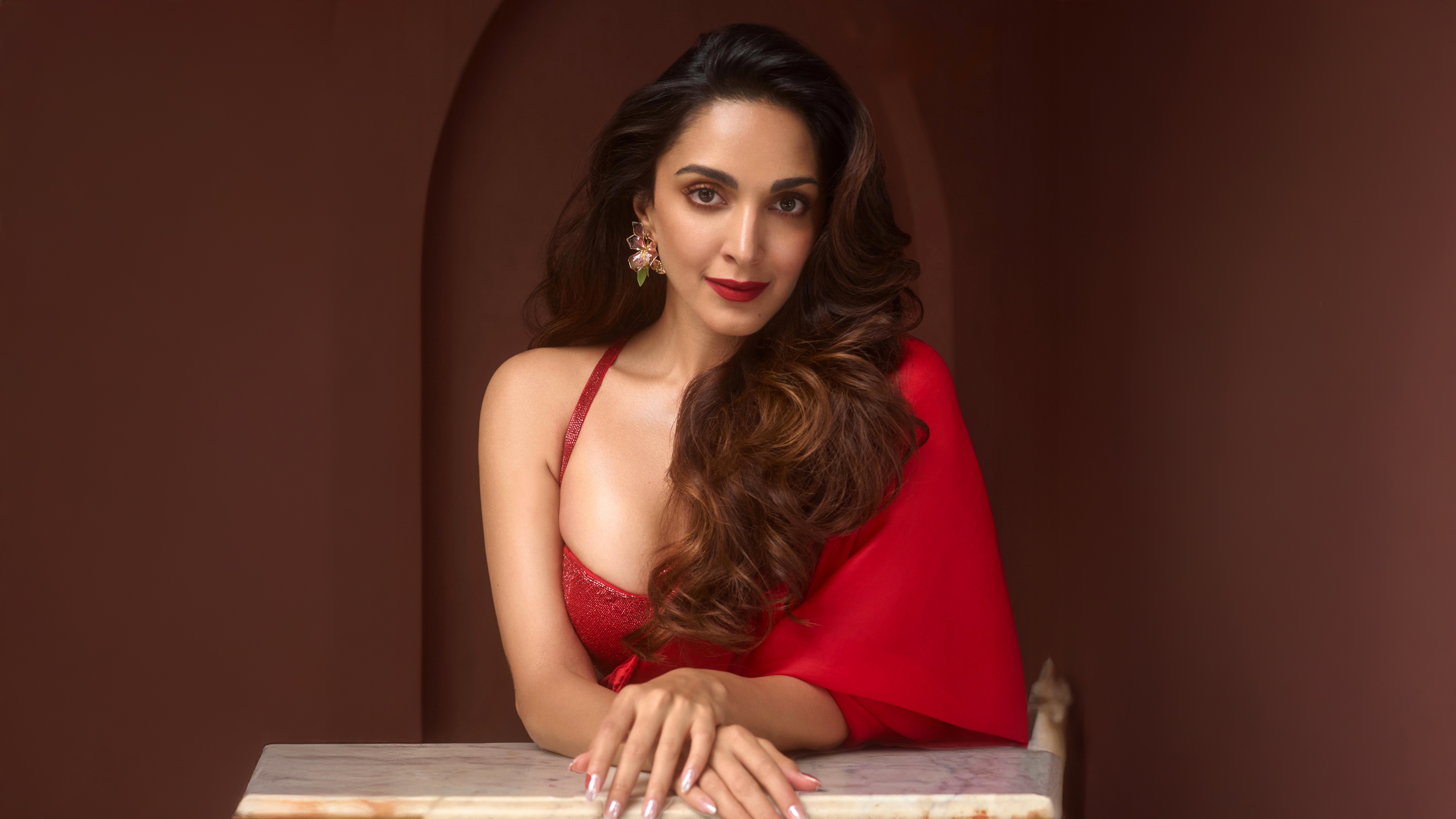 Kiara Advani wearing a beautiful red saree with red lips