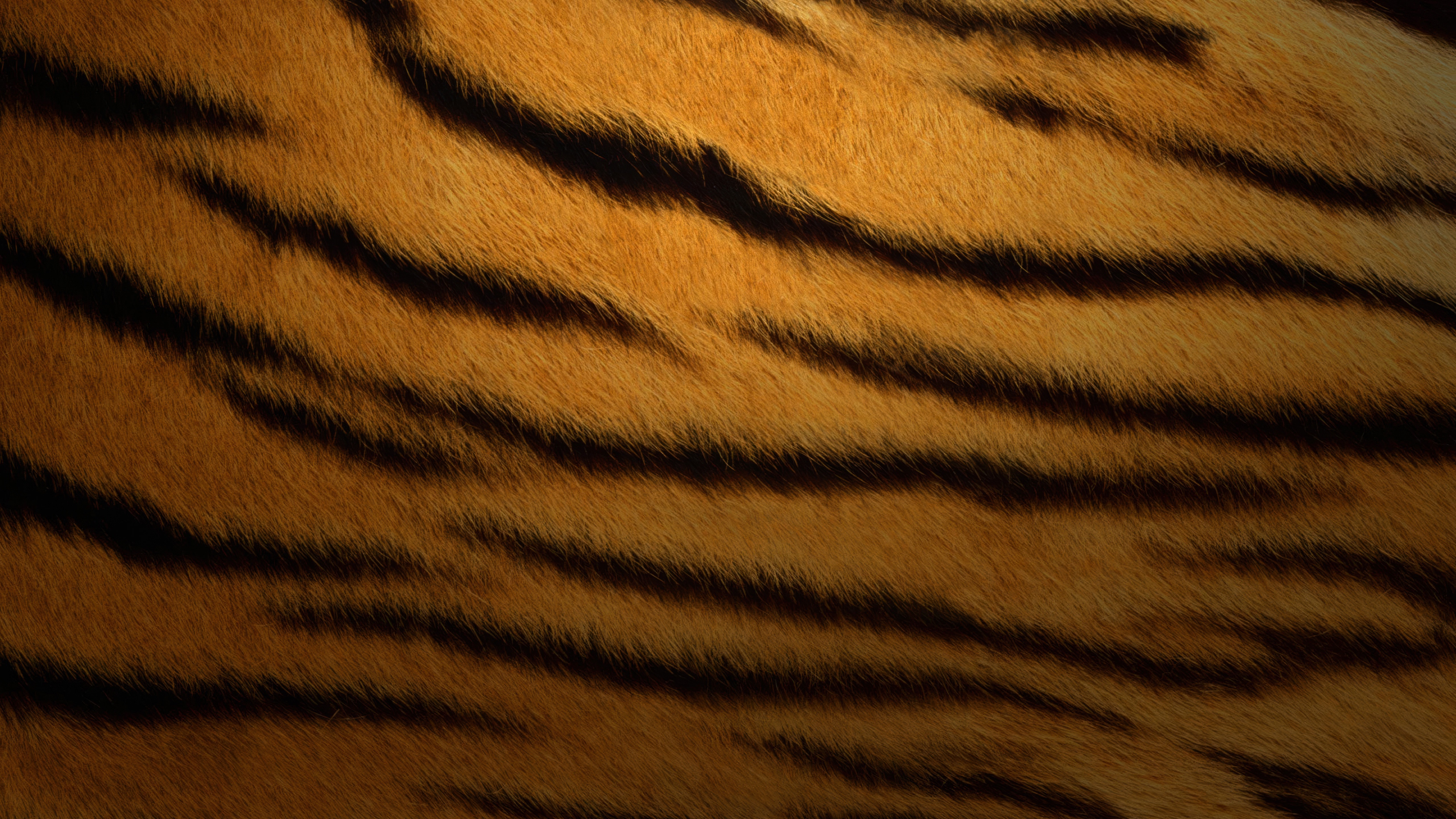Abstract blue and aqua swirling texture inspired by Mac OS X Tiger wallpaper.
