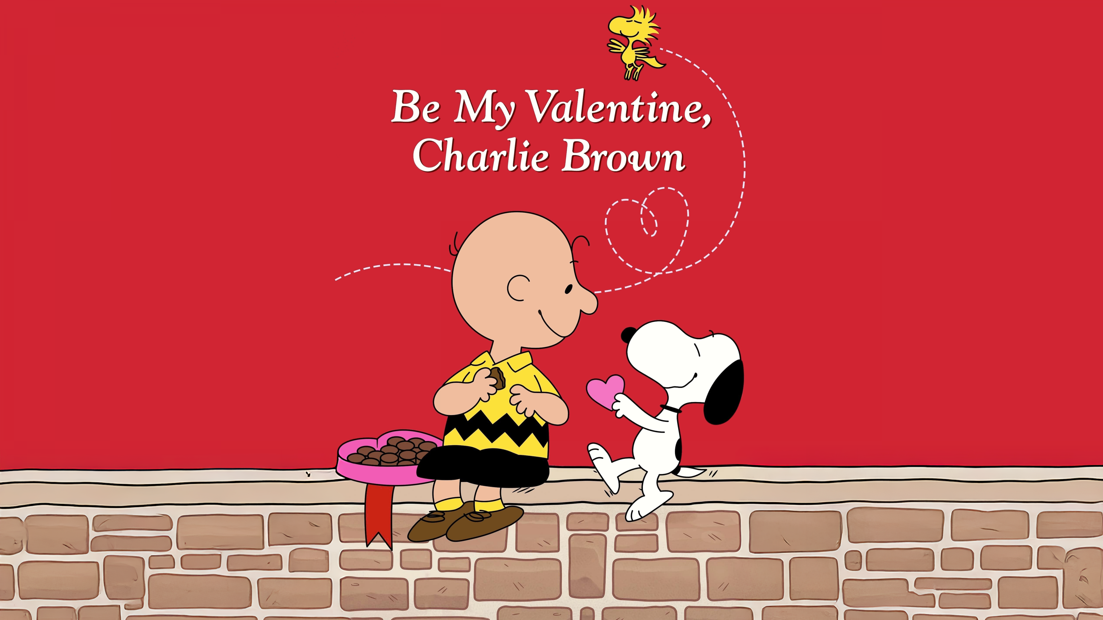 Snoopy, Charlie Brown, and Woodstock from Peanuts celebrating Valentine's Day against a red background.