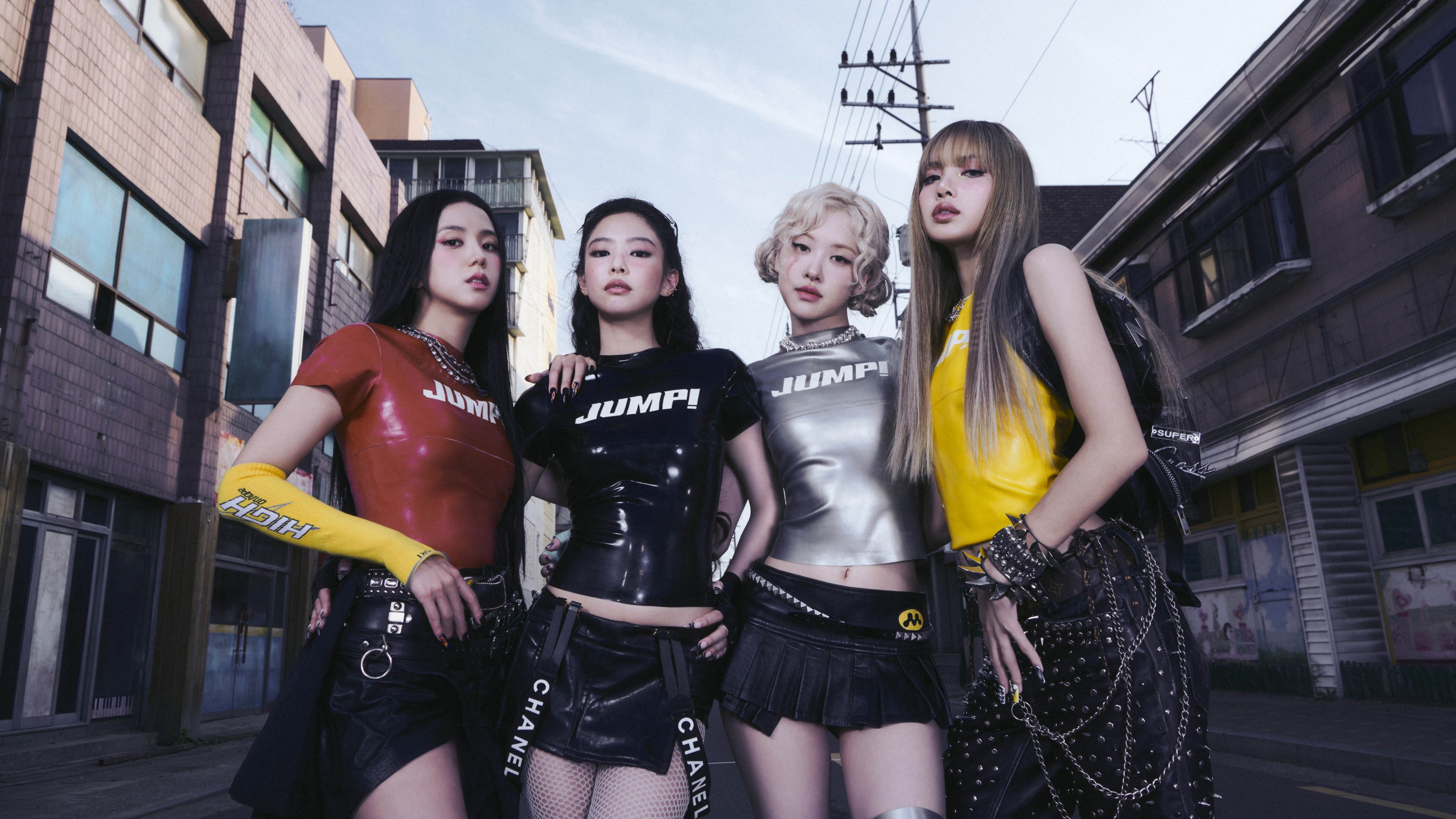 Close-up portrait of Blackpink members Jennie, Rosé, Lisa, and Jisoo in a high-definition 2025 aesthetic.