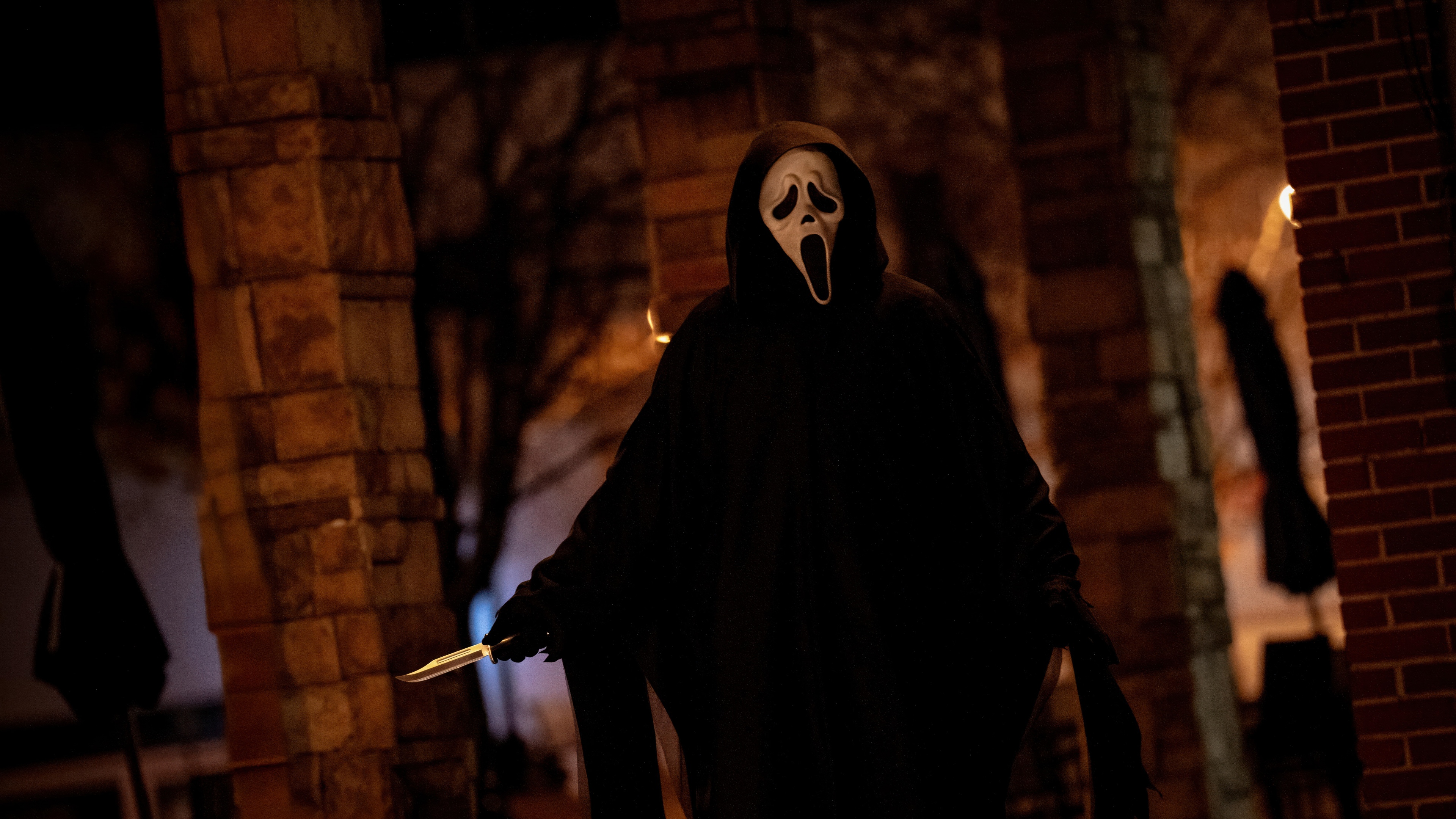 A detailed and terrifying close-up of the Ghostface mask from the Scream horror movie franchise.
