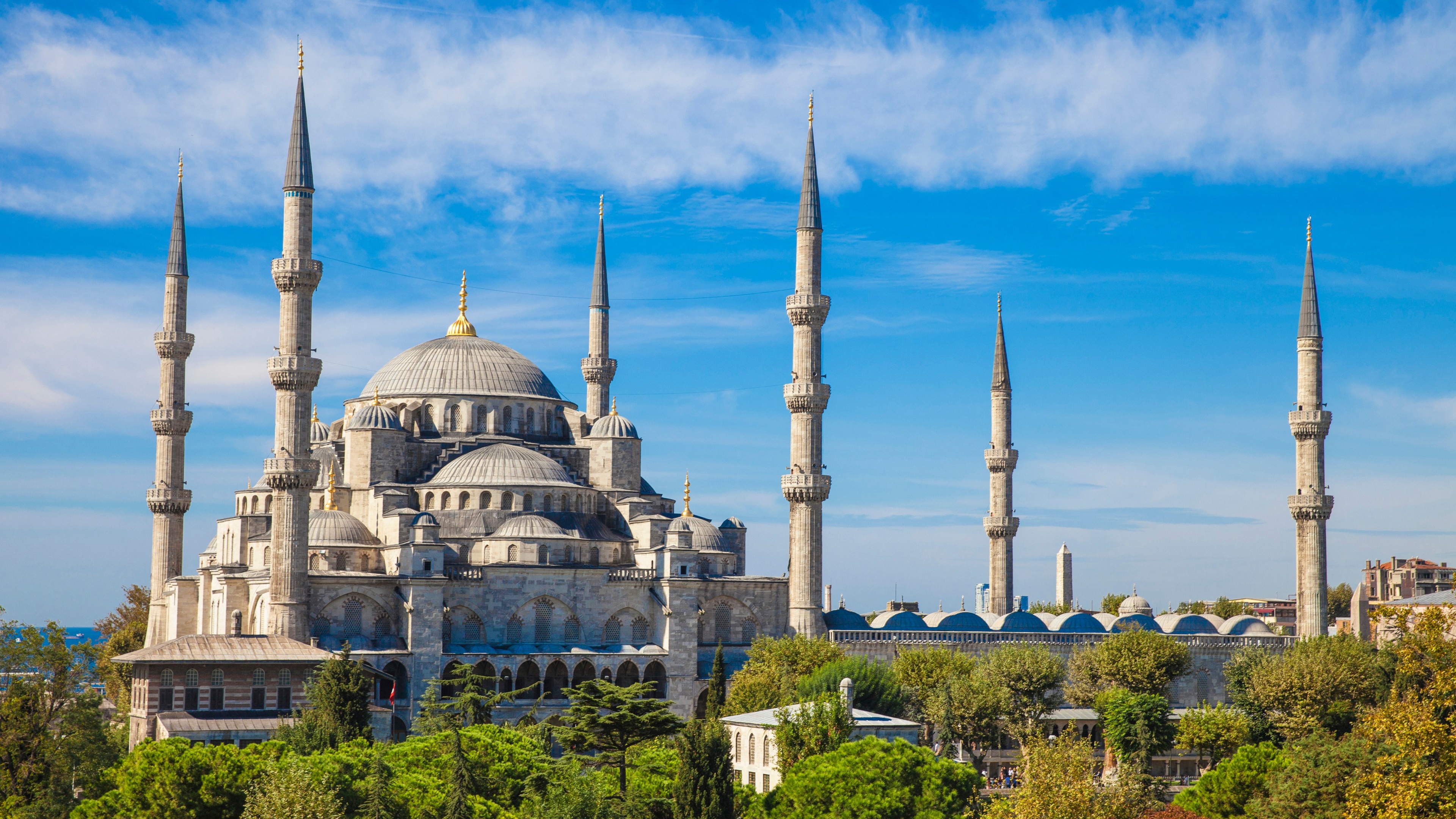 A grand view of the Blue Mosque (Sultan Ahmed Mosque) in Istanbul, featuring its magnificent domes and classical Islamic architecture.