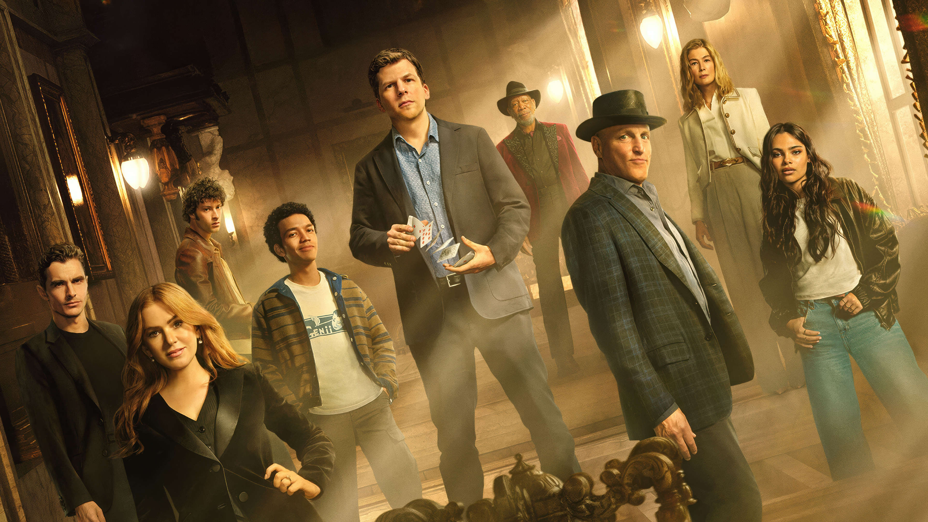 Cinematic movie poster for Now You See Me: Now You Don't featuring a mysterious magician surrounded by floating playing cards and magical effects.
