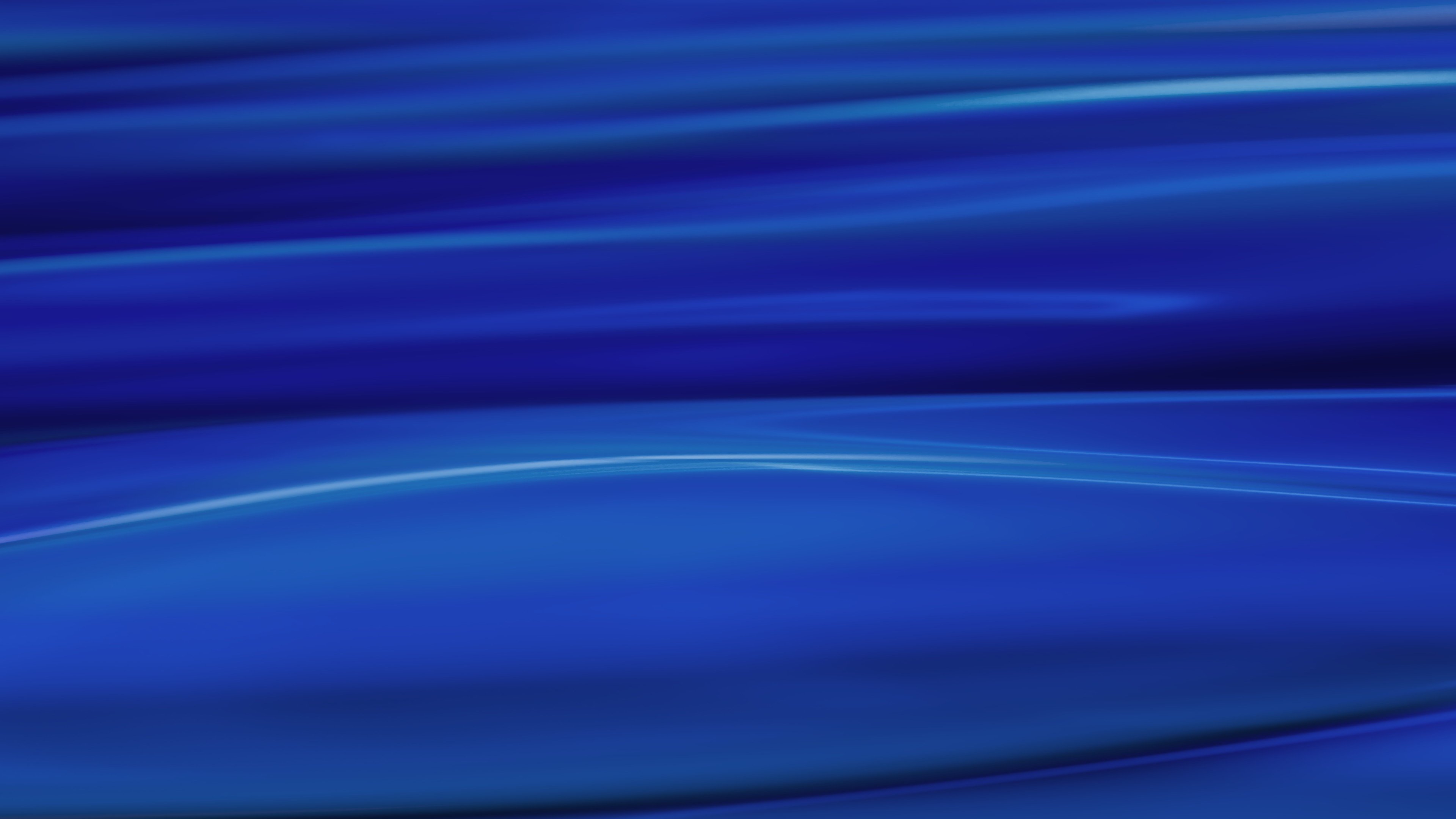 Abstract smooth deep blue waves inspired by the cosmos with a fluid, flowing design.