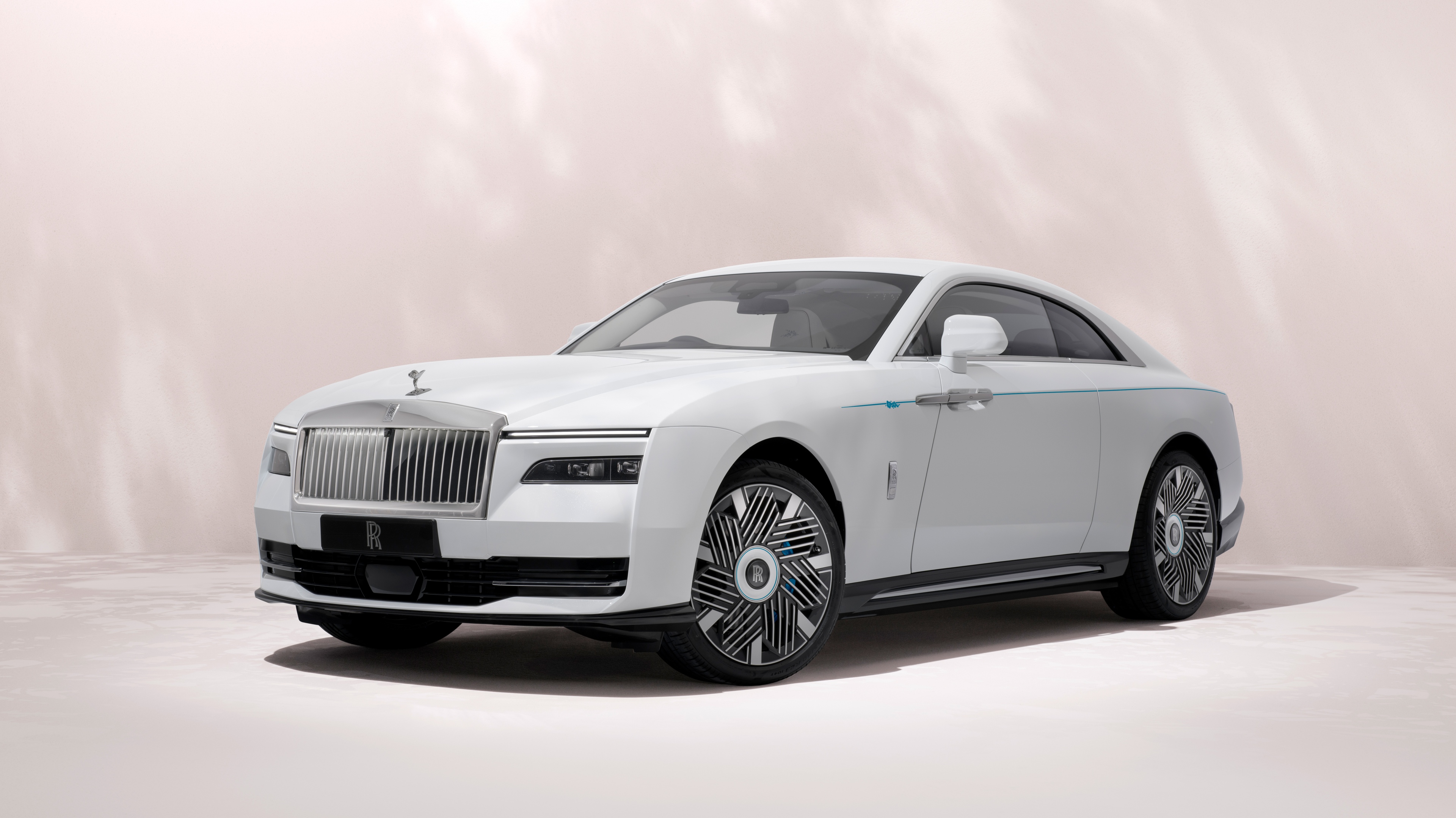 A high-resolution, detailed close-up of the sleek and luxurious Rolls-Royce Spectre electric car.