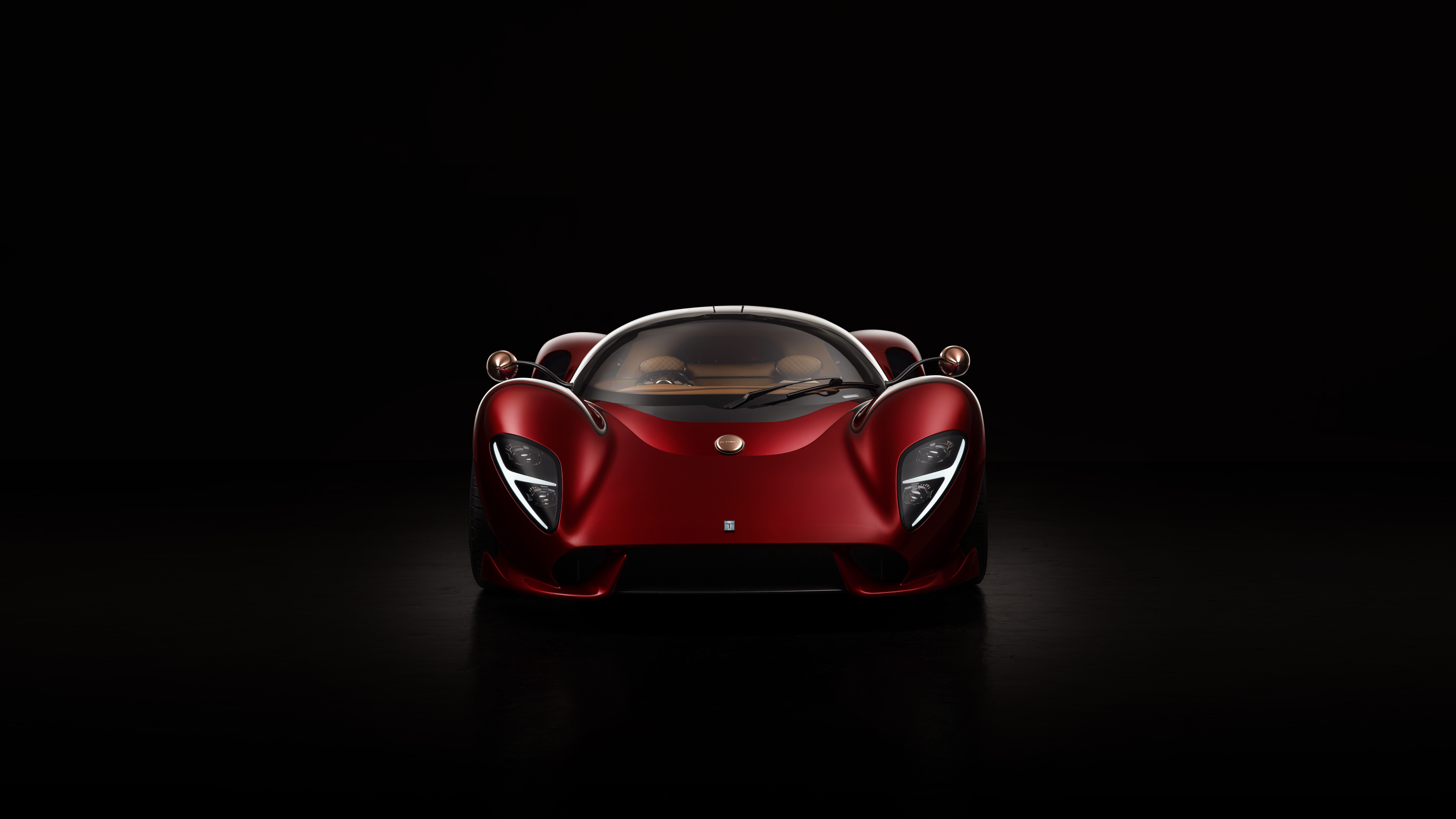 A detailed close-up of the De Tomaso P72 supercar, highlighting its aerodynamic body and luxurious metallic finish.