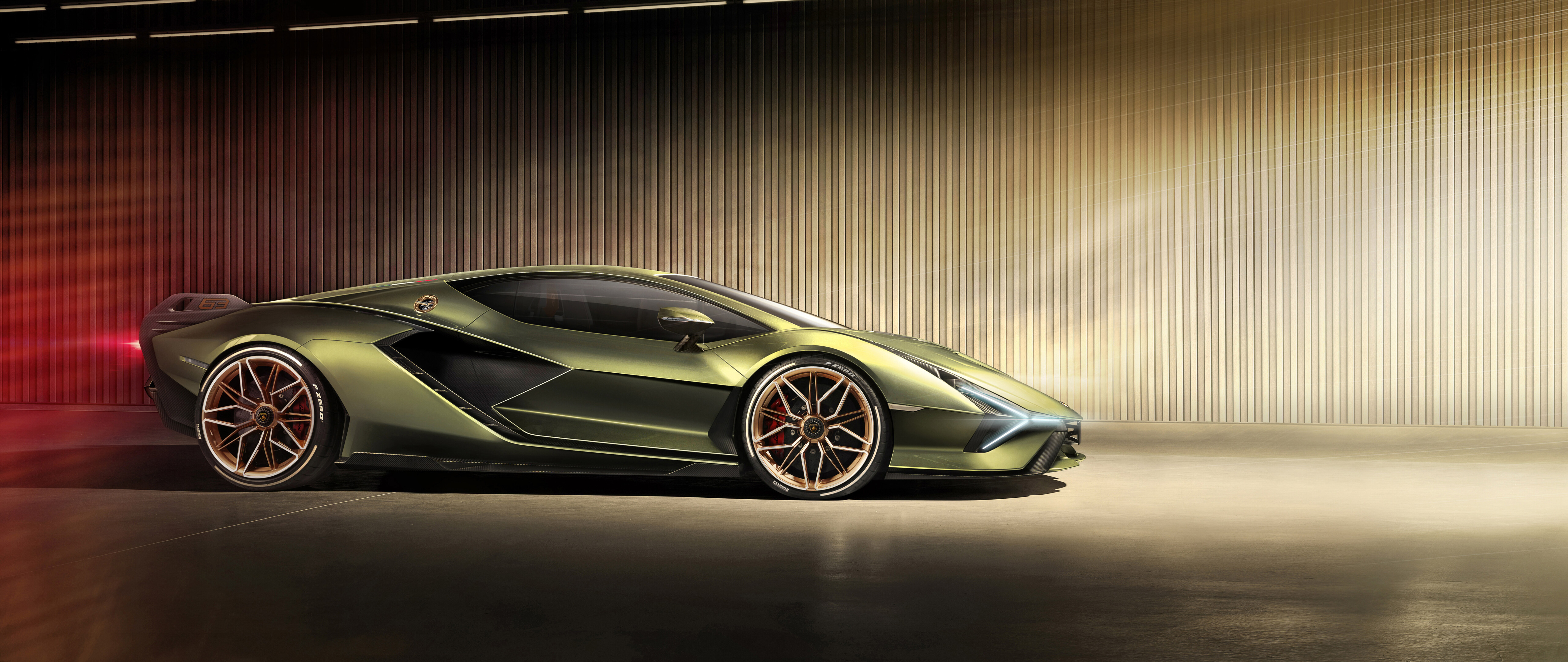 A high-performance emerald green Lamborghini Sián FKP 37 supercar parked prominently.