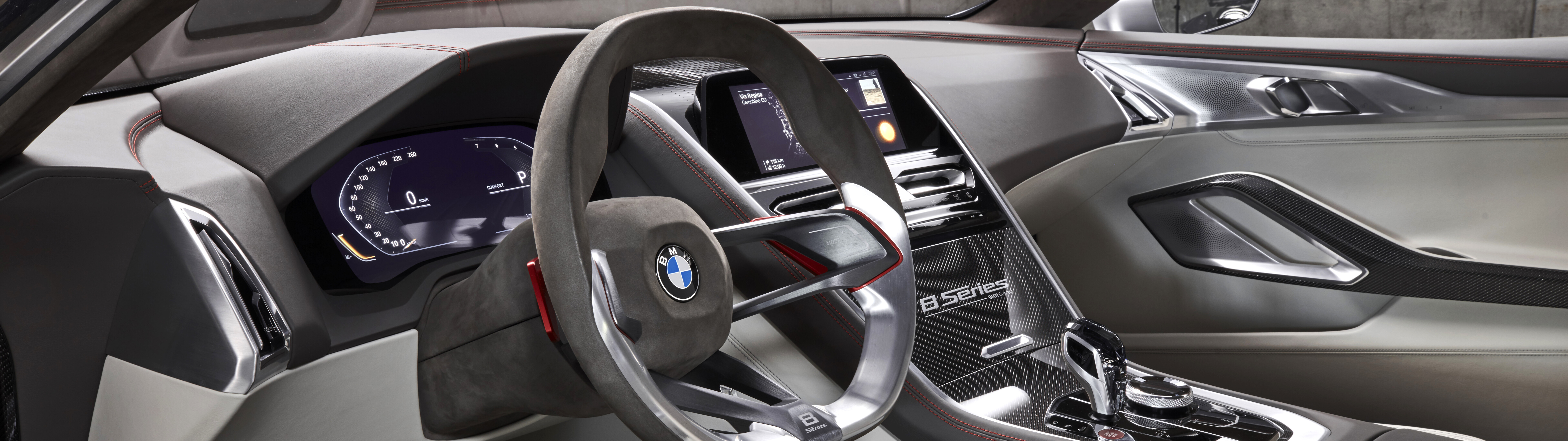 Detailed view of the high-tech dashboard and premium interior components of the BMW Concept 8 Series concept car.