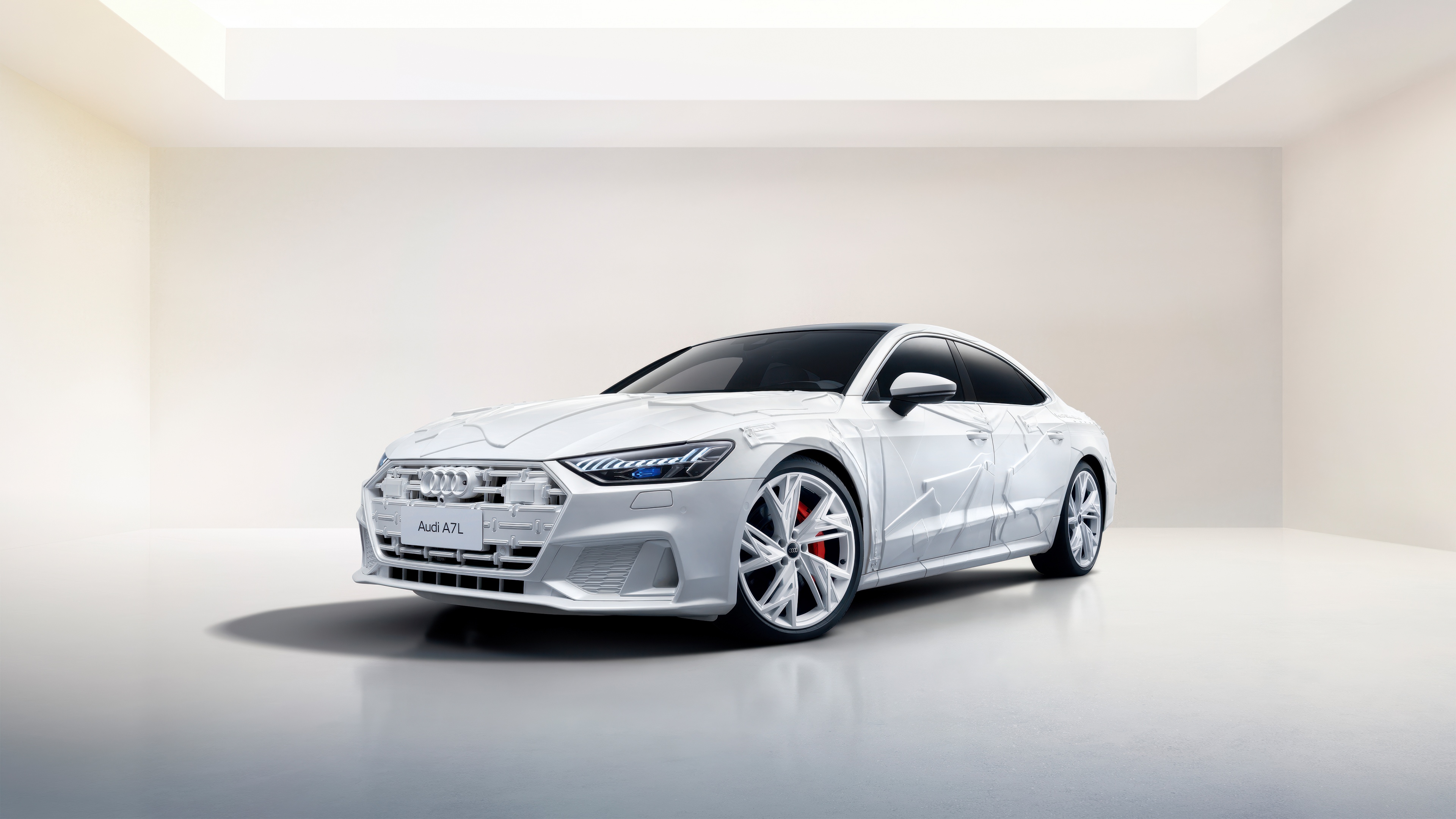 A high-resolution shot of a white 2025 Audi A7L 55 TFSI quattro sedan featuring a minimalist white aesthetic.