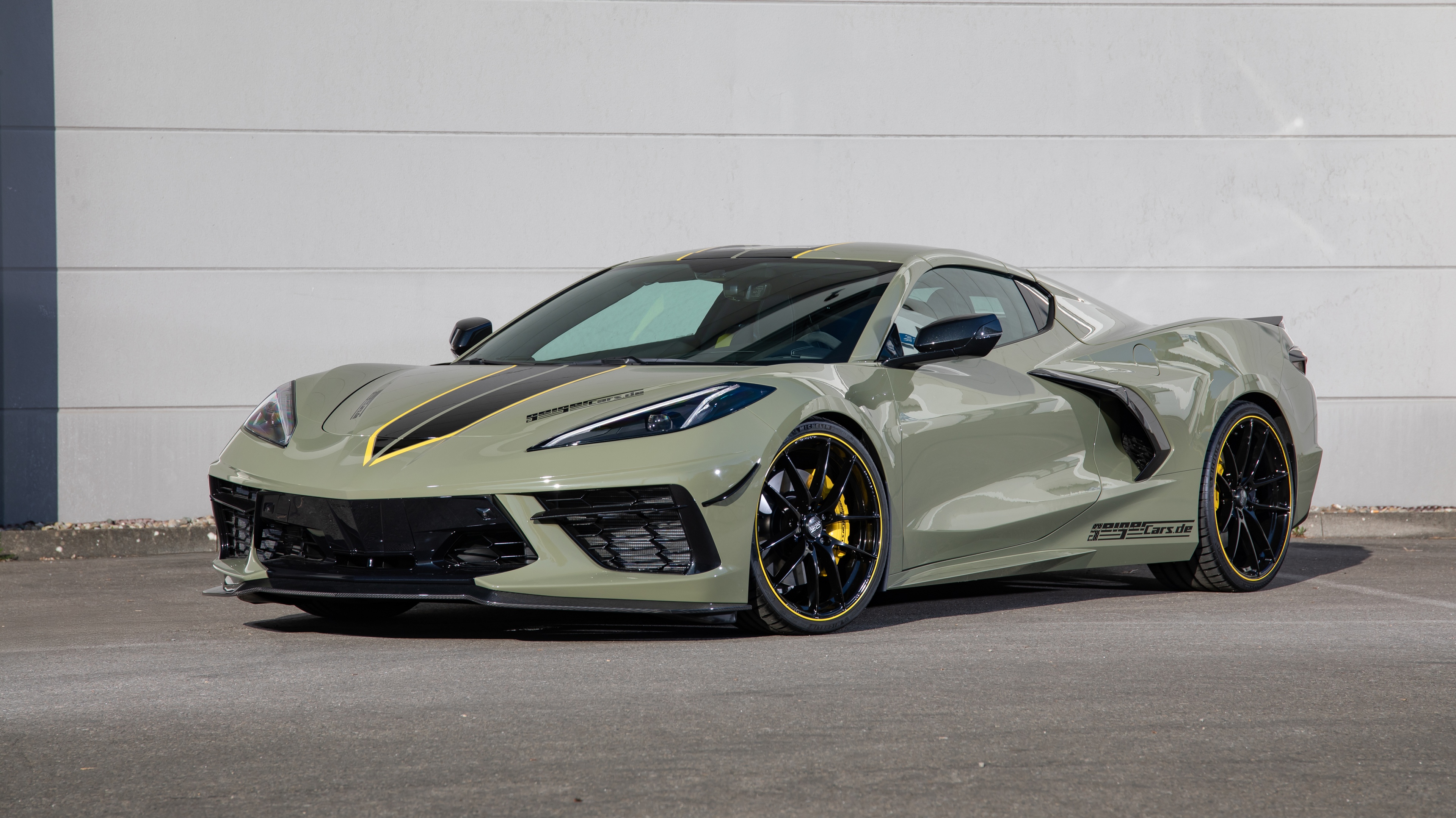 A high-detail, professional photograph of a 2025 Chevrolet Corvette Stingray showcasing its aerodynamic body and premium finish.