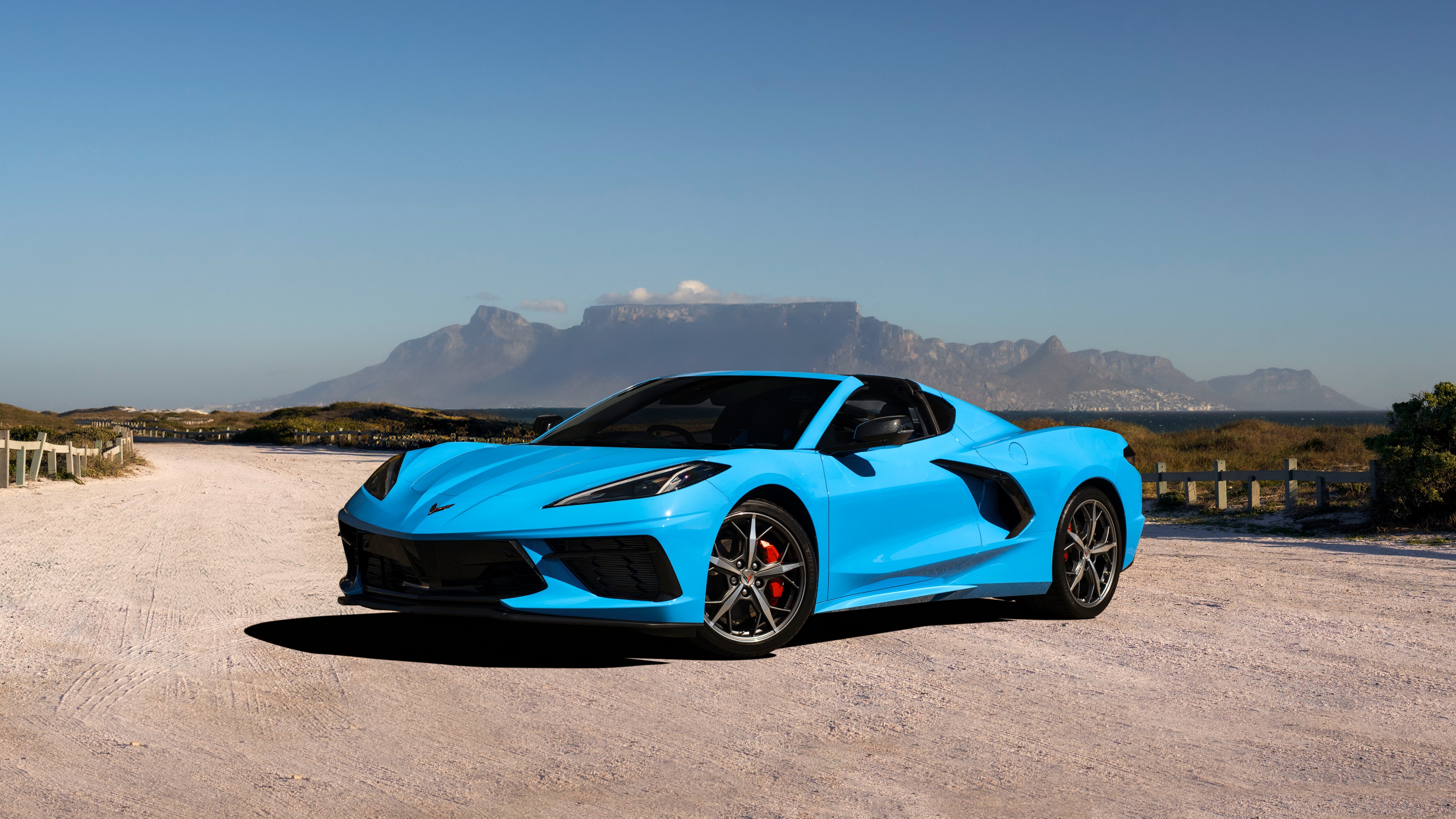A detailed, high-resolution close-up of the 2025 Chevrolet Corvette Stingray featuring sleek aerodynamic design.