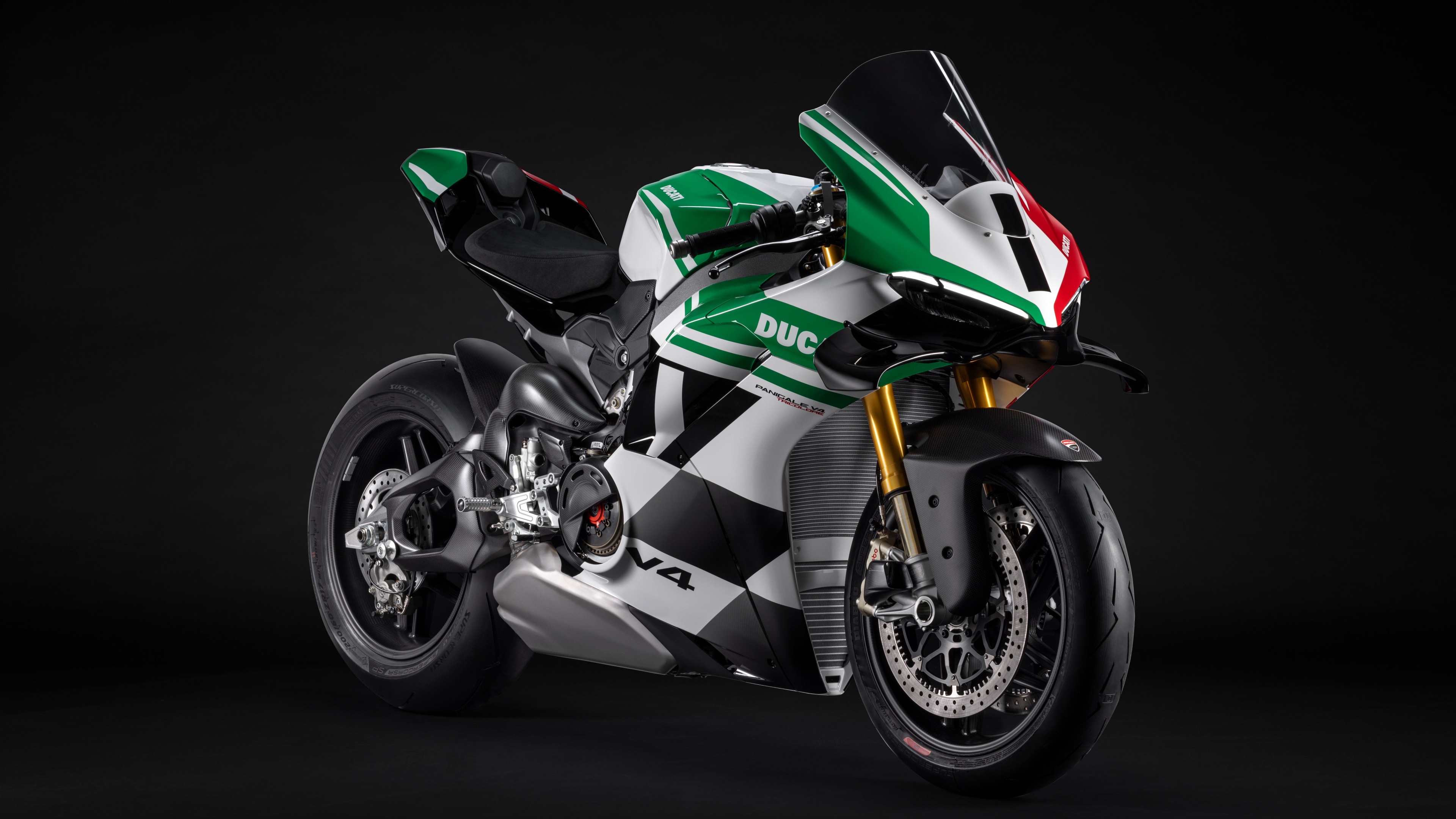 A highly detailed, cinematic close-up of a 2025 Ducati Panigale V4 Tricolore motorcycle against a dark, minimalist background.
