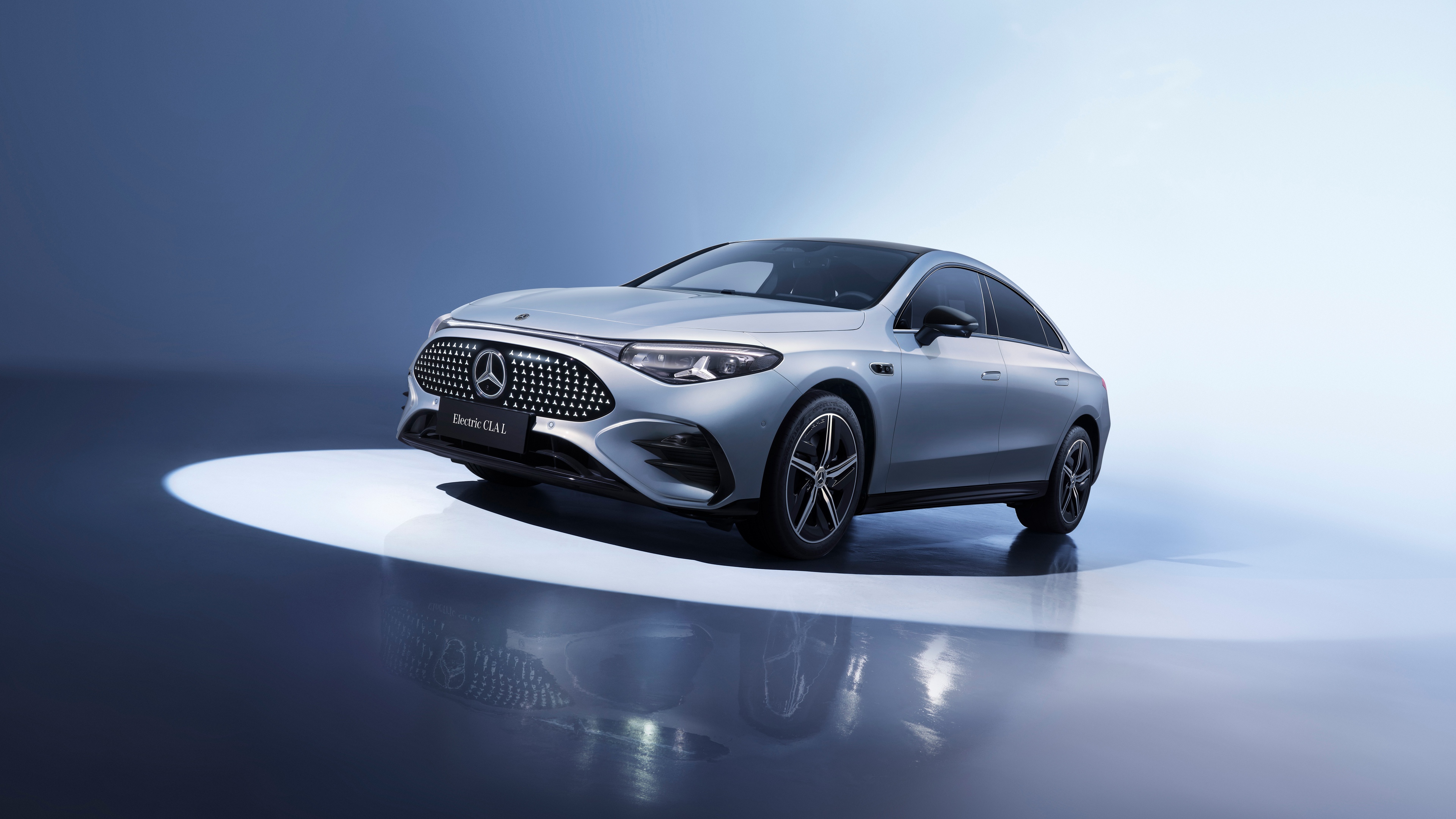 A high-resolution, detailed view of the 2025 Mercedes-Benz CLA 300 L with AMG Line styling.