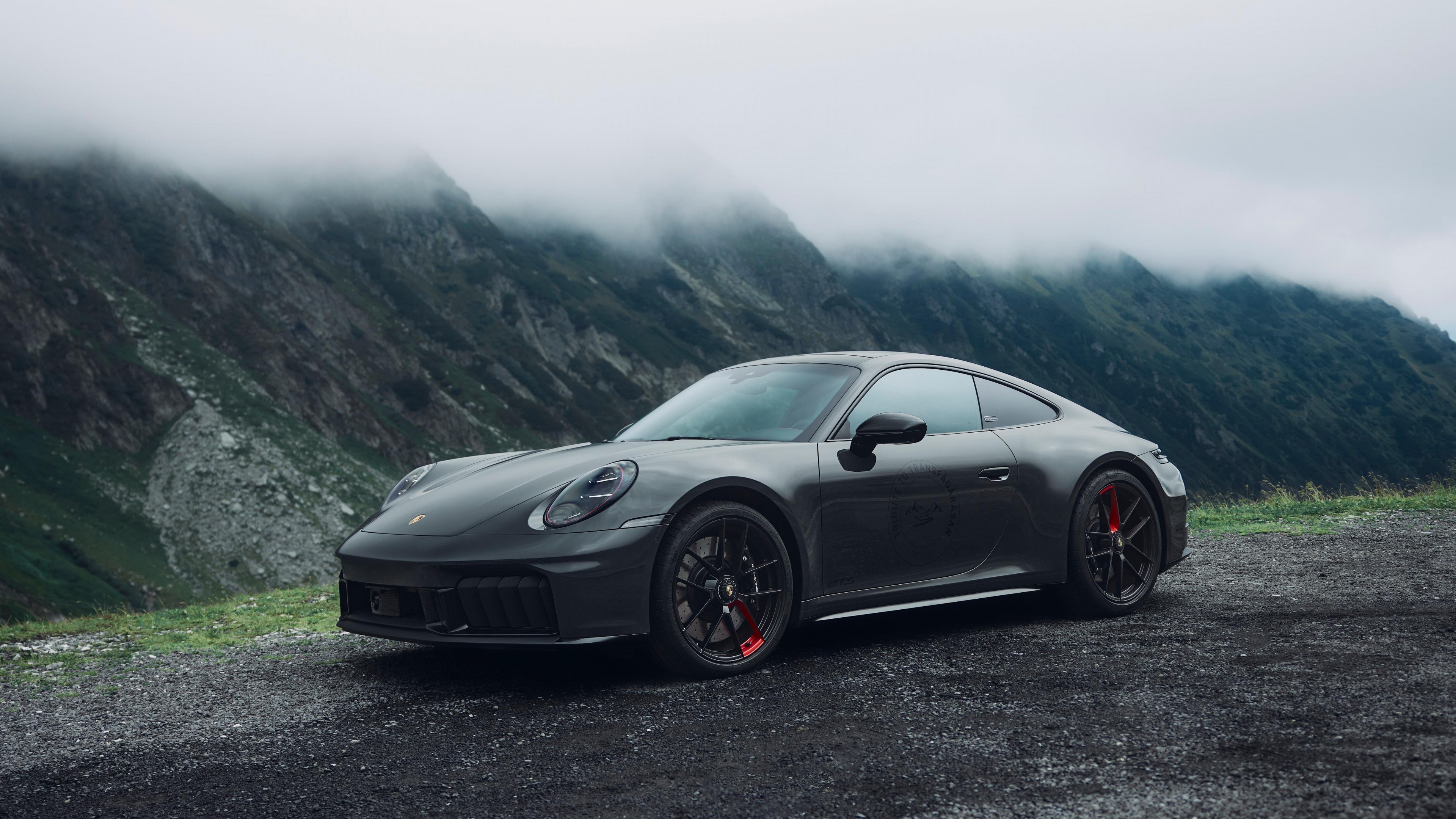 A high-resolution 5K close-up of the 2025 Porsche 911 Carrera 4 GTS showcasing its premium design and metallic finish.