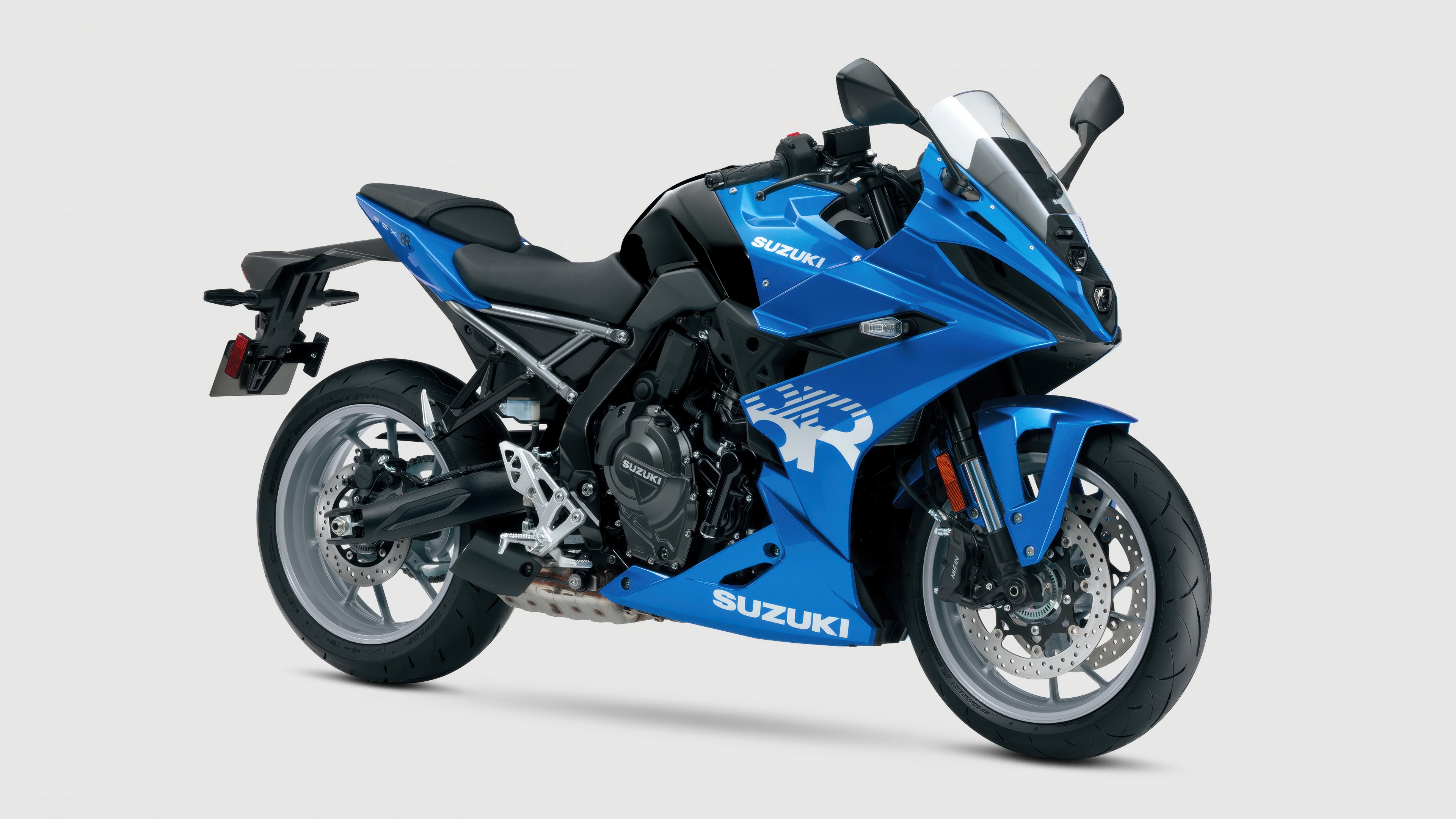 A high-detail studio photograph of the 2025 Suzuki GSX-8R sports motorcycle on a white background.
