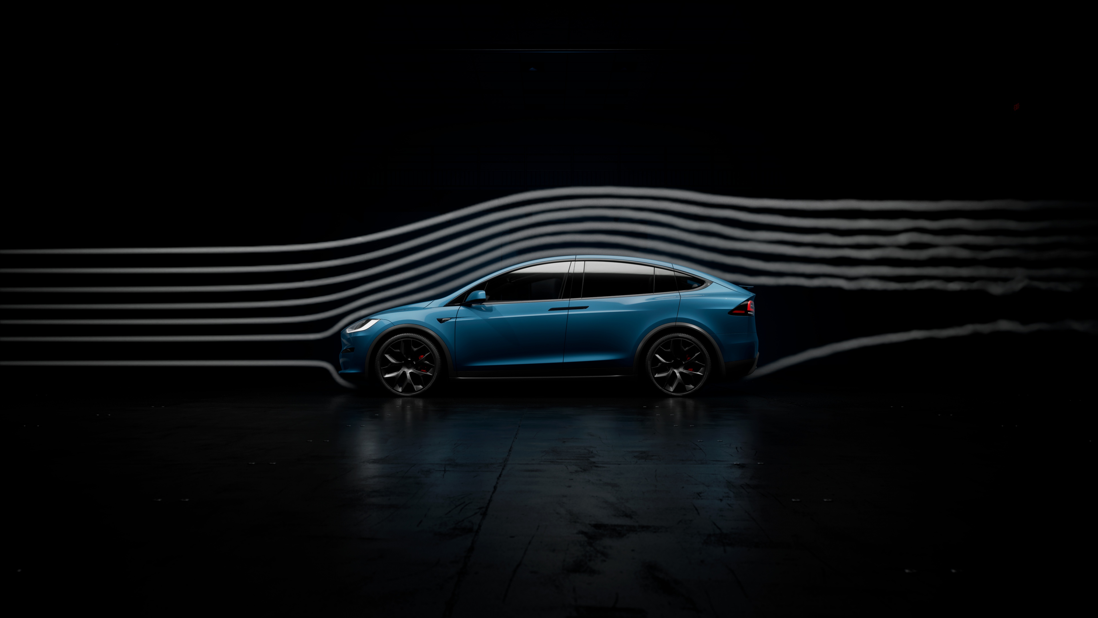 A 2025 Tesla Model X Plaid electric SUV presented in a dark, minimalist setting.