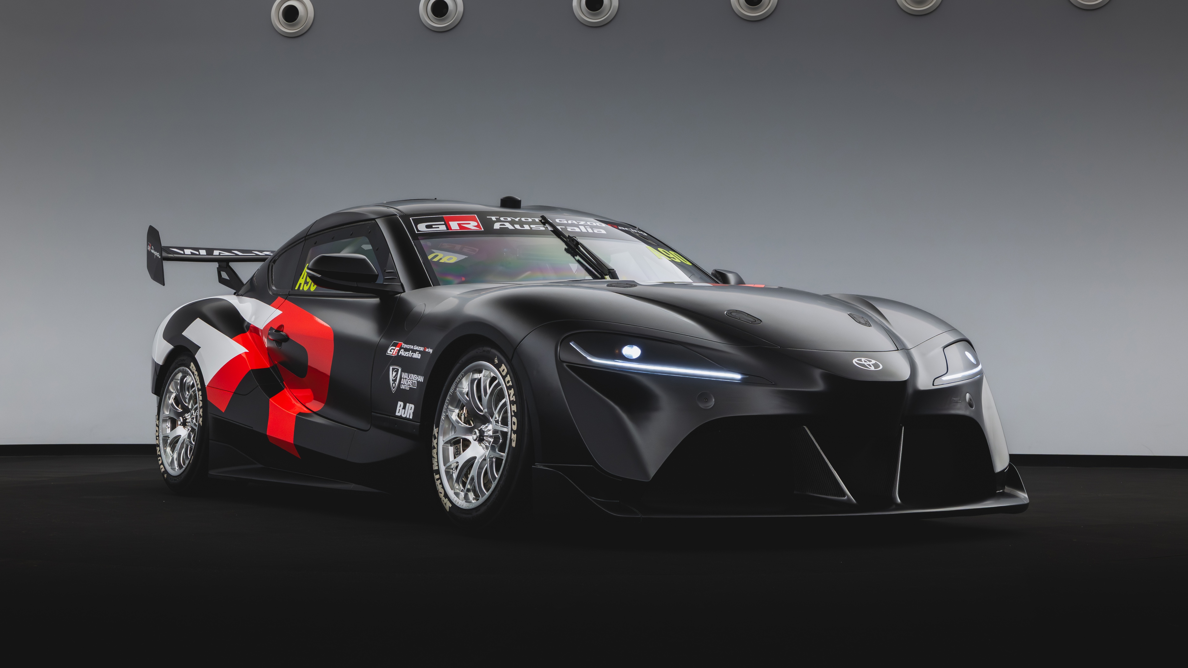 A sleek and futuristic 2026 Toyota GR Supra supercar featuring advanced aerodynamic styling.