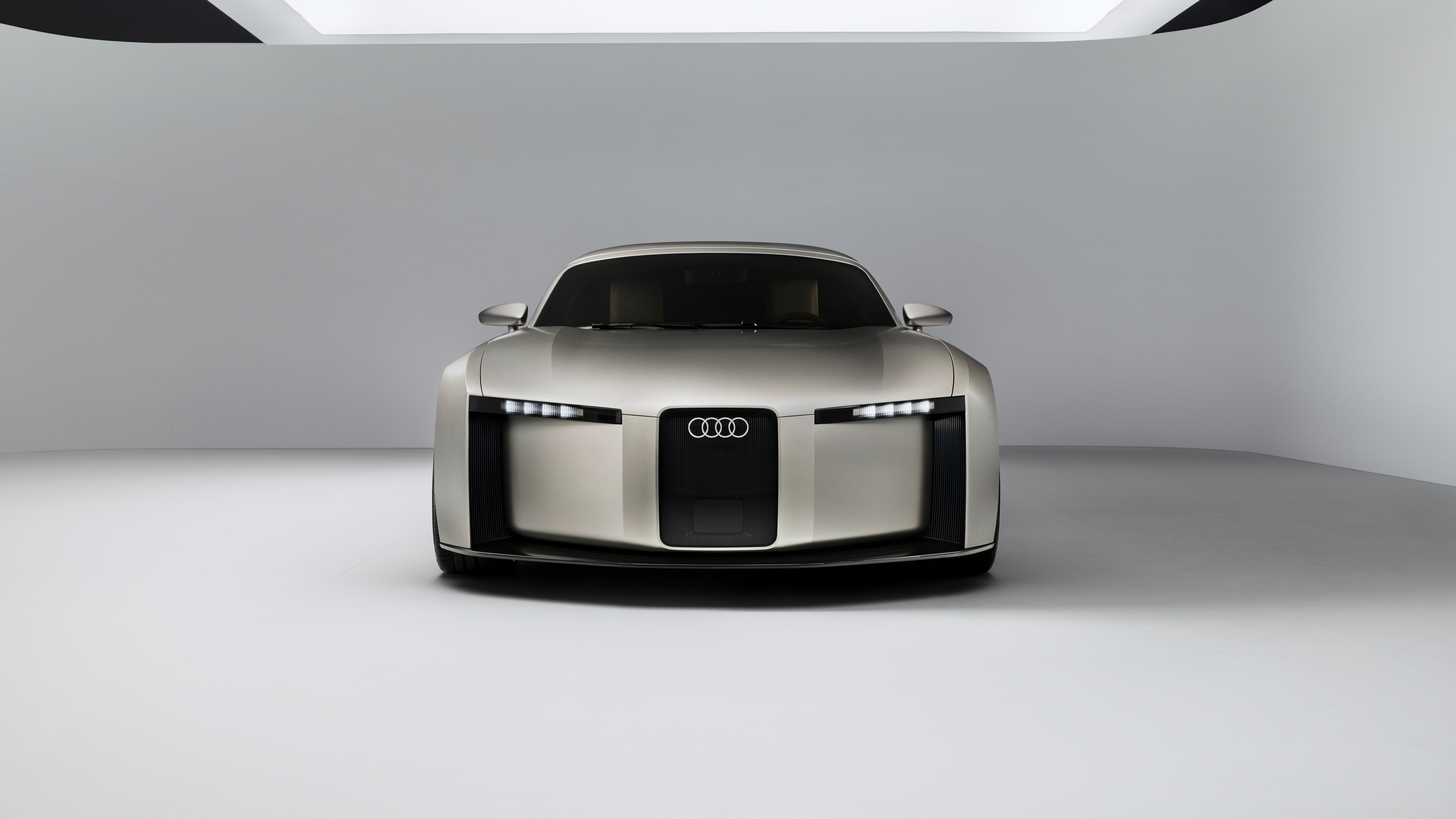 A sleek and modern Audi Concept C electric sports car with a futuristic aerodynamic design.