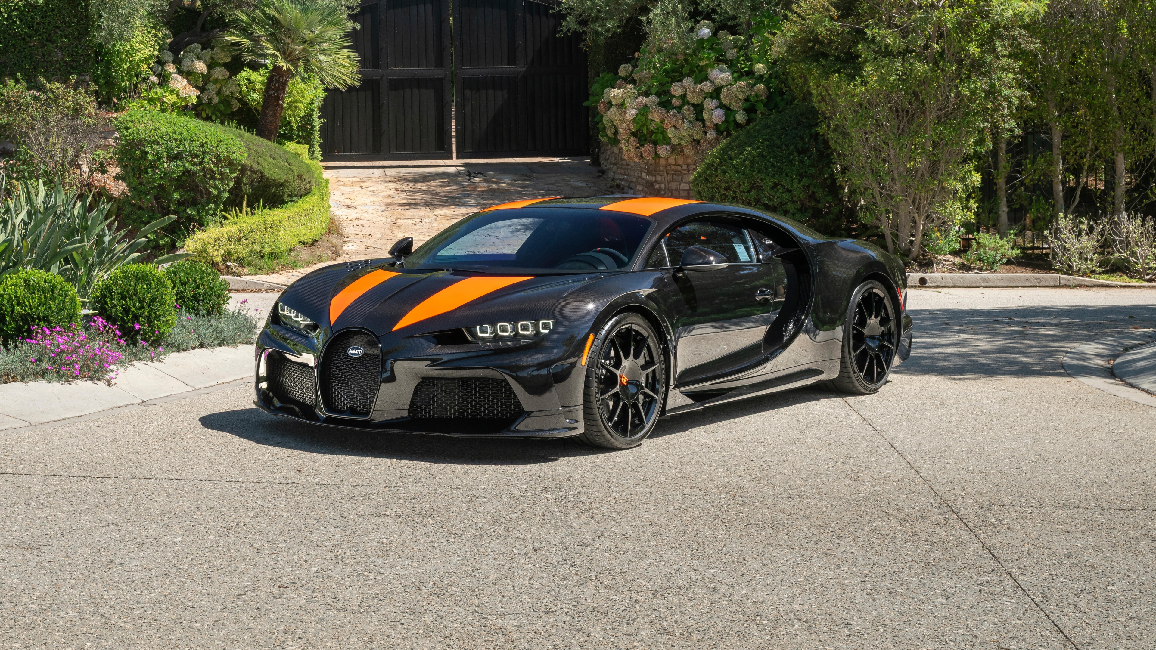 A high-detail, 5K rendering of the Bugatti Chiron Super Sport 300+ luxury hypercar.