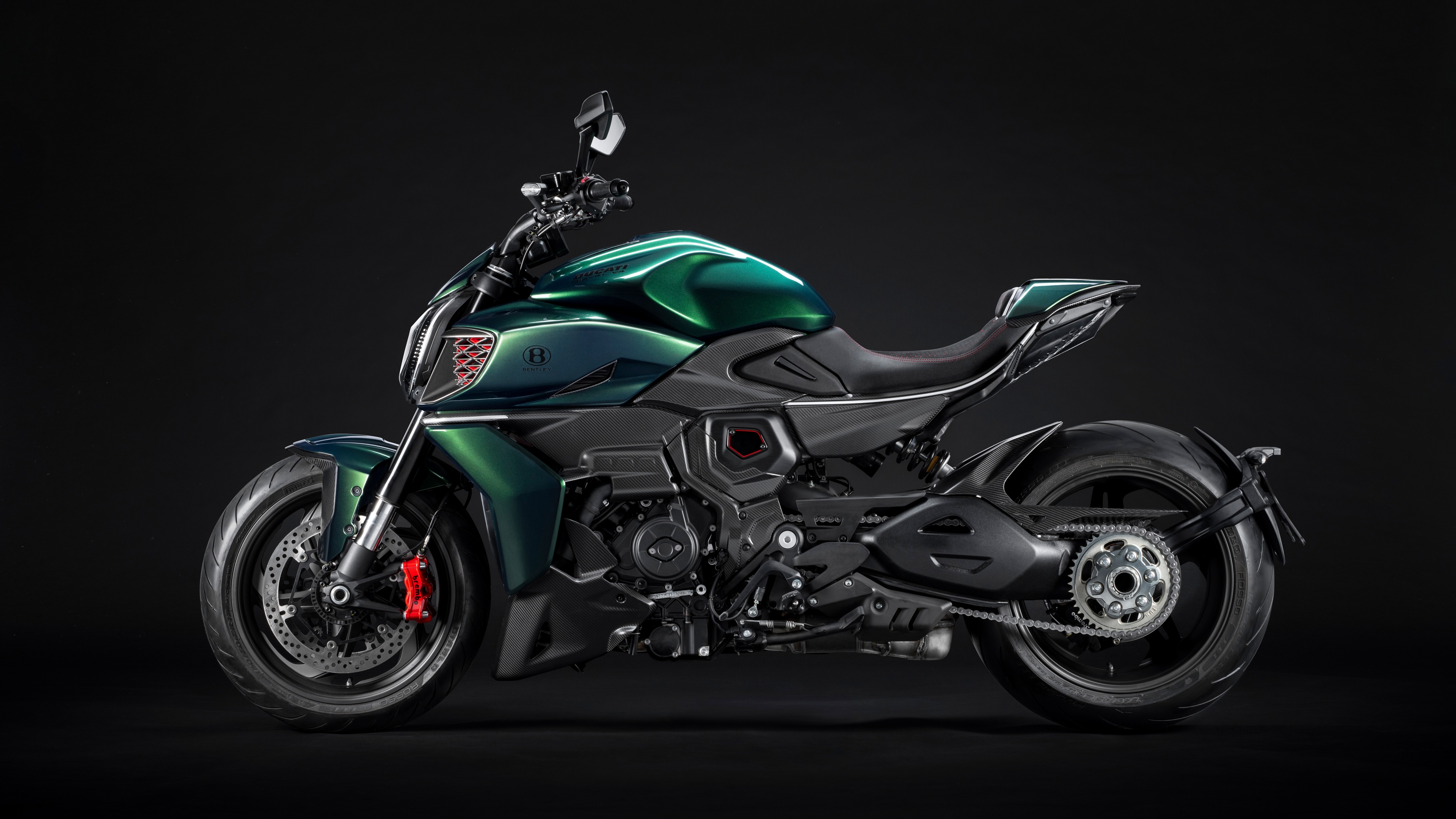 A detailed, high-resolution shot of the Ducati Diavel for Bentley luxury motorcycle featuring premium textures and a dark, moody atmosphere.