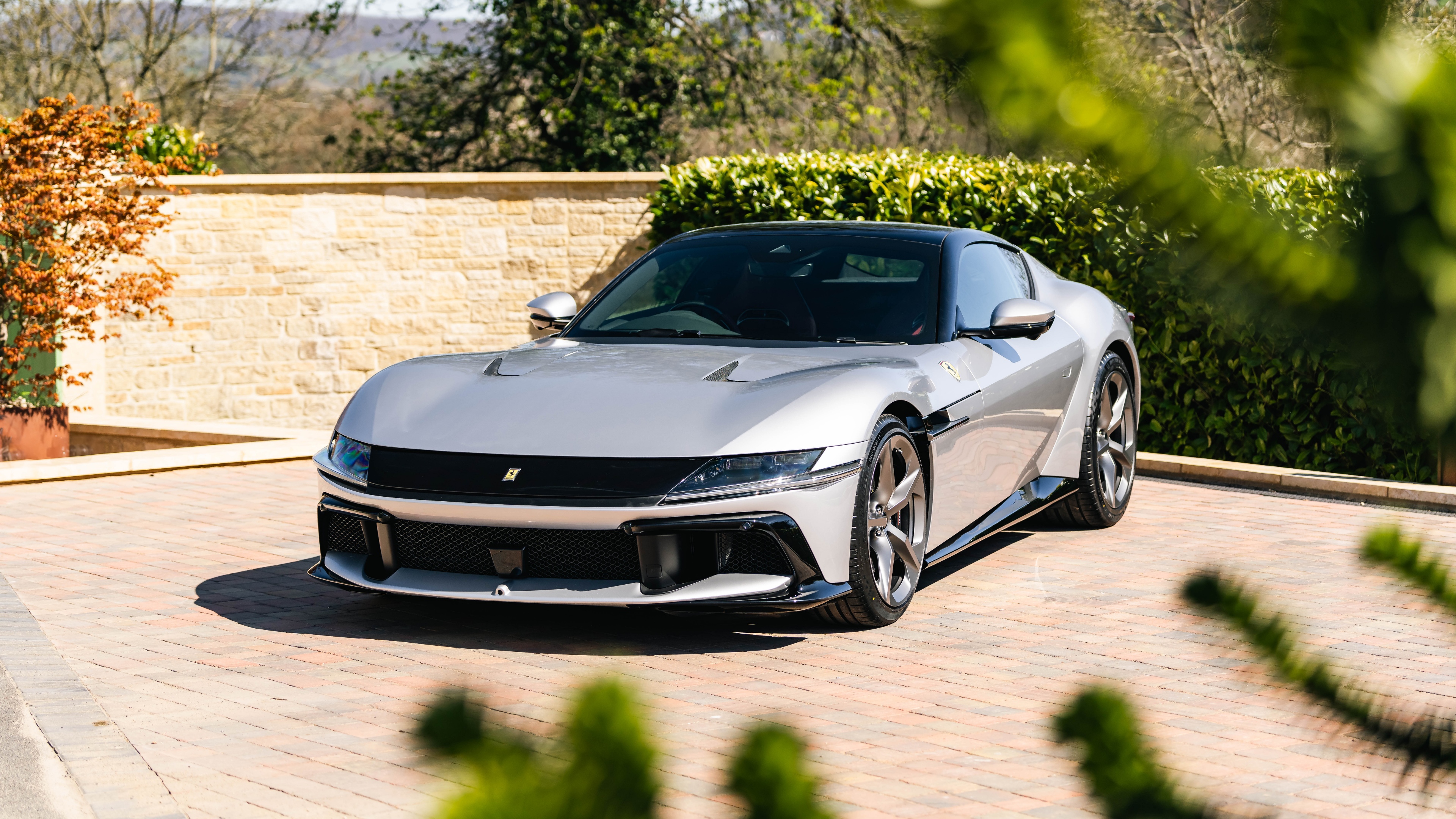 A highly detailed, high-resolution view of the 2025 Ferrari 12Cilindri, featuring its iconic Italian sports car design and aerodynamic silhouette.