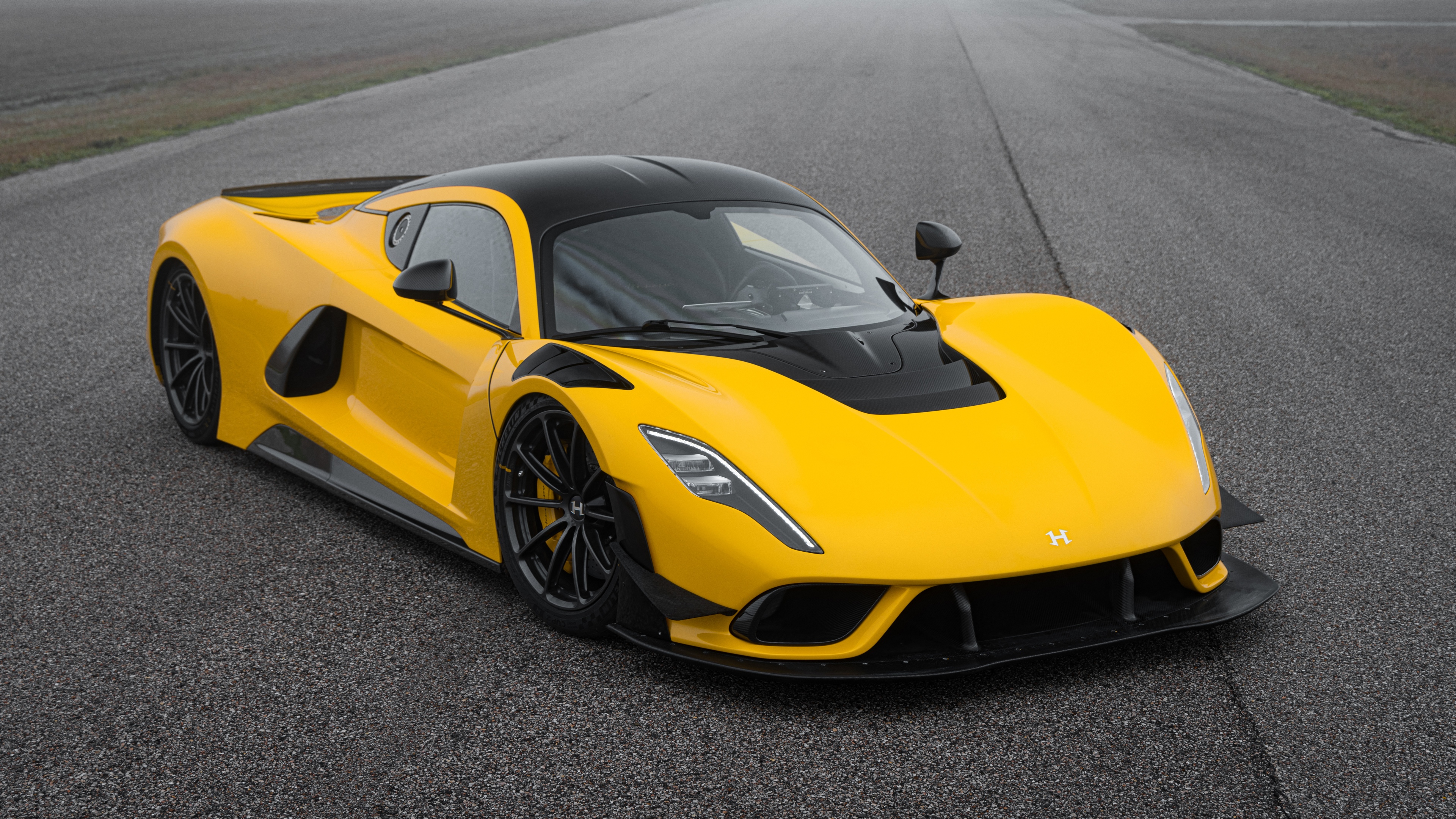 A sleek, futuristic 2025 prototype car with aerodynamic bodywork and advanced lighting.