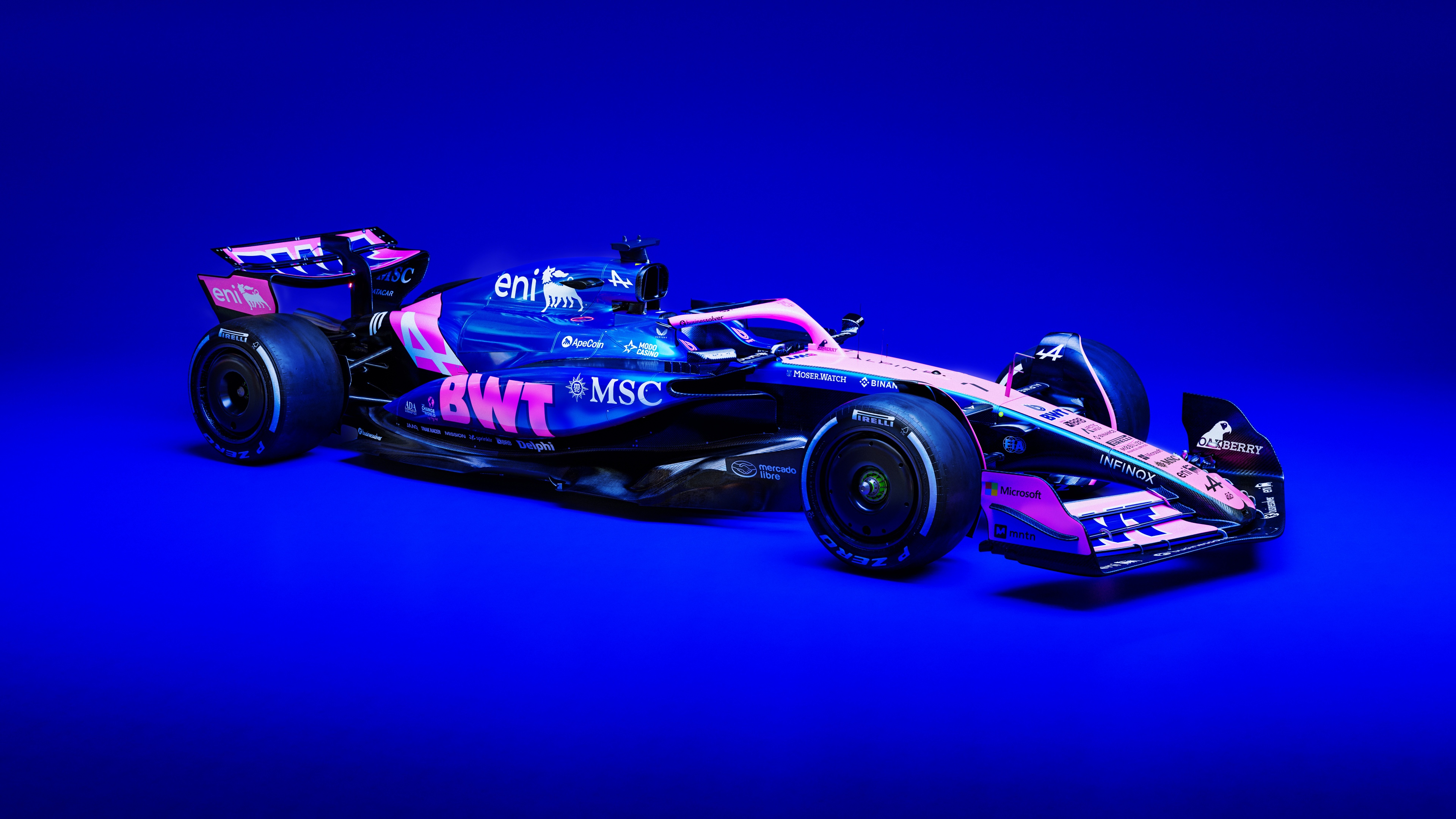 A collection of futuristic Formula One racing cars with a blue aesthetic and blue background.