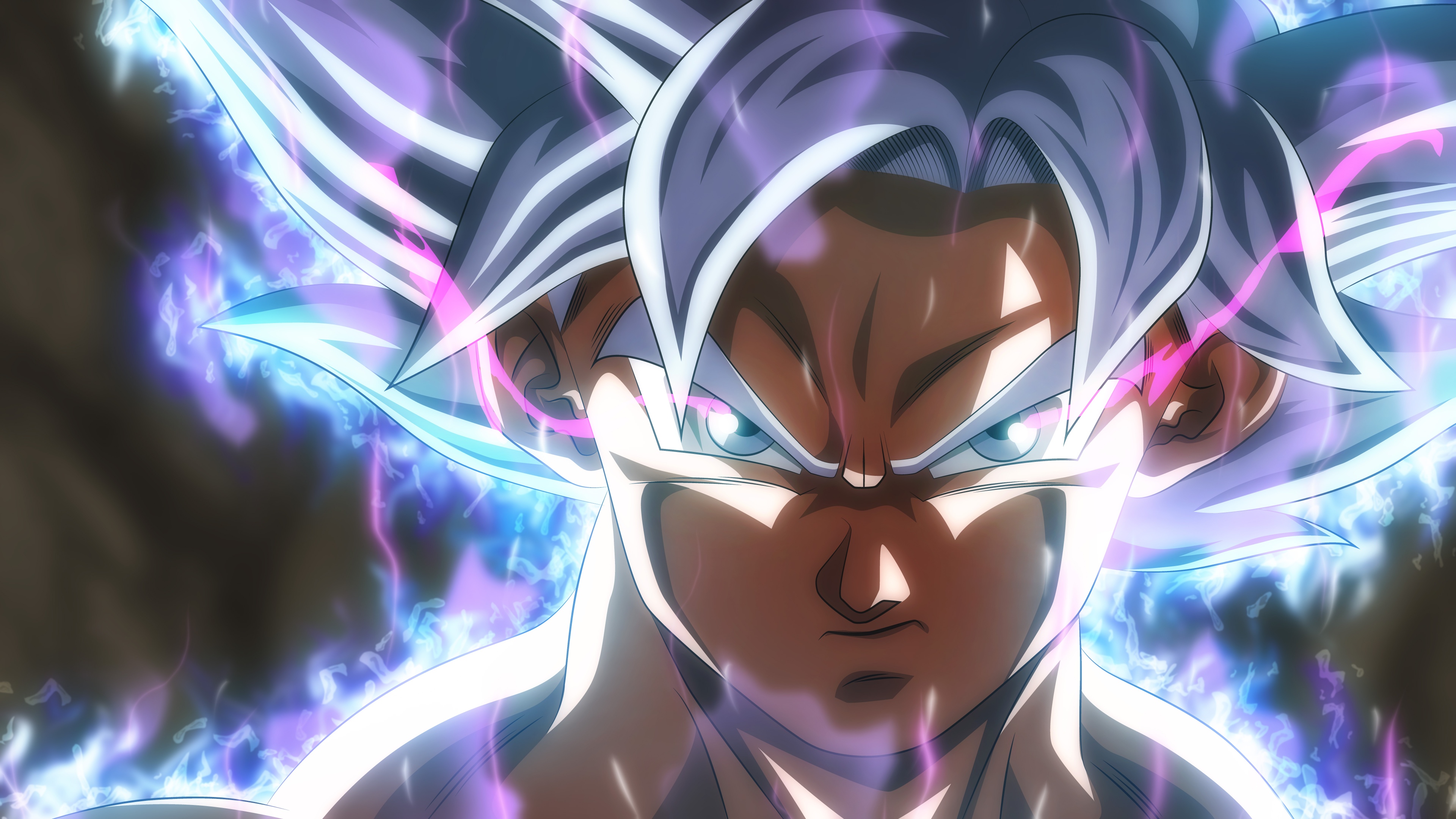 Goku in his Ultra Instinct Omen form from Dragon Ball Super with a glowing aura and silver eyes.