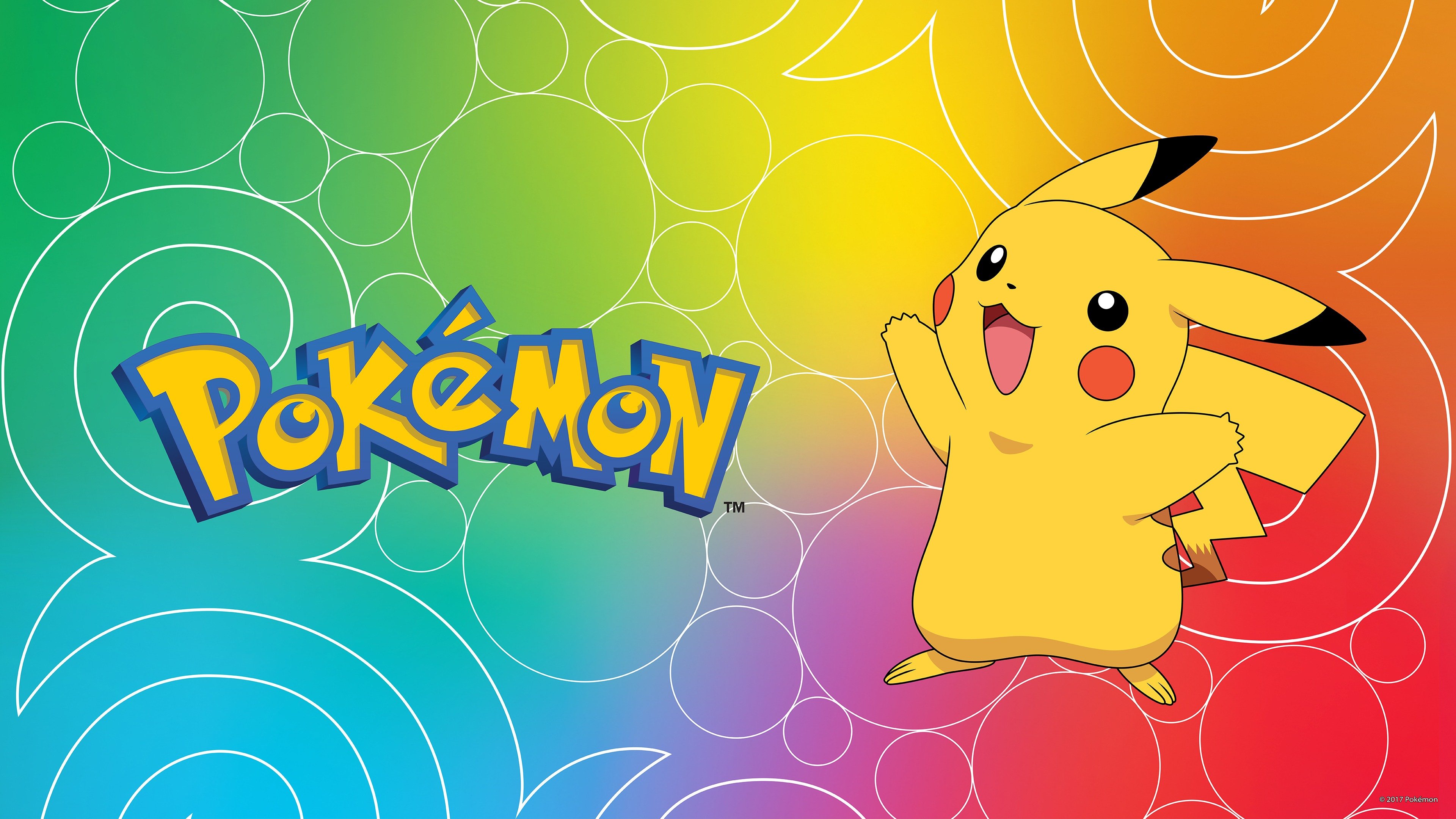 Pikachu from Pokémon standing in front of a colorful, rainbow-colored background.