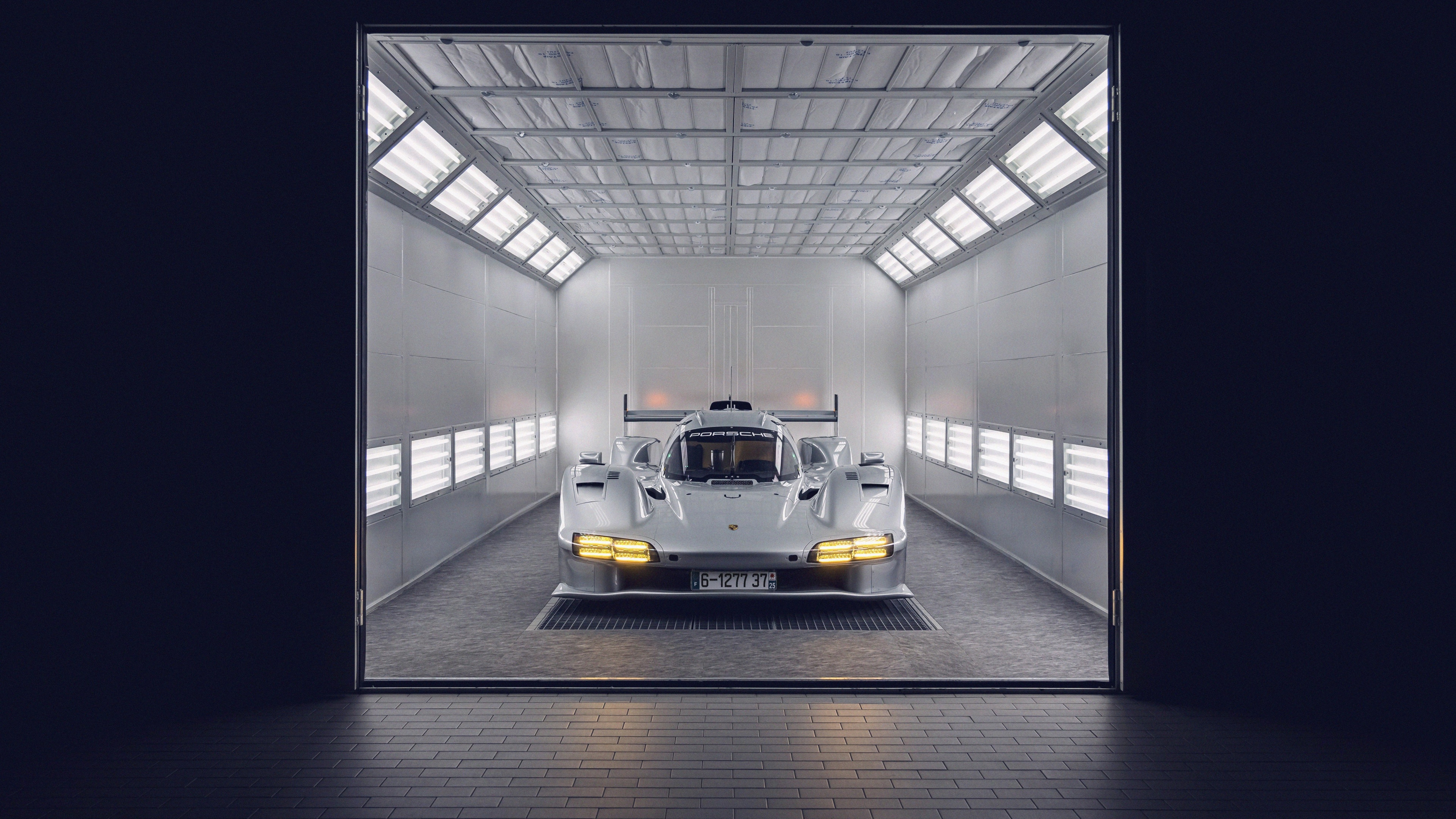 A sleek and aerodynamic Porsche 963 prototype hypercar, showcasing its cutting-edge design and racing technology.
