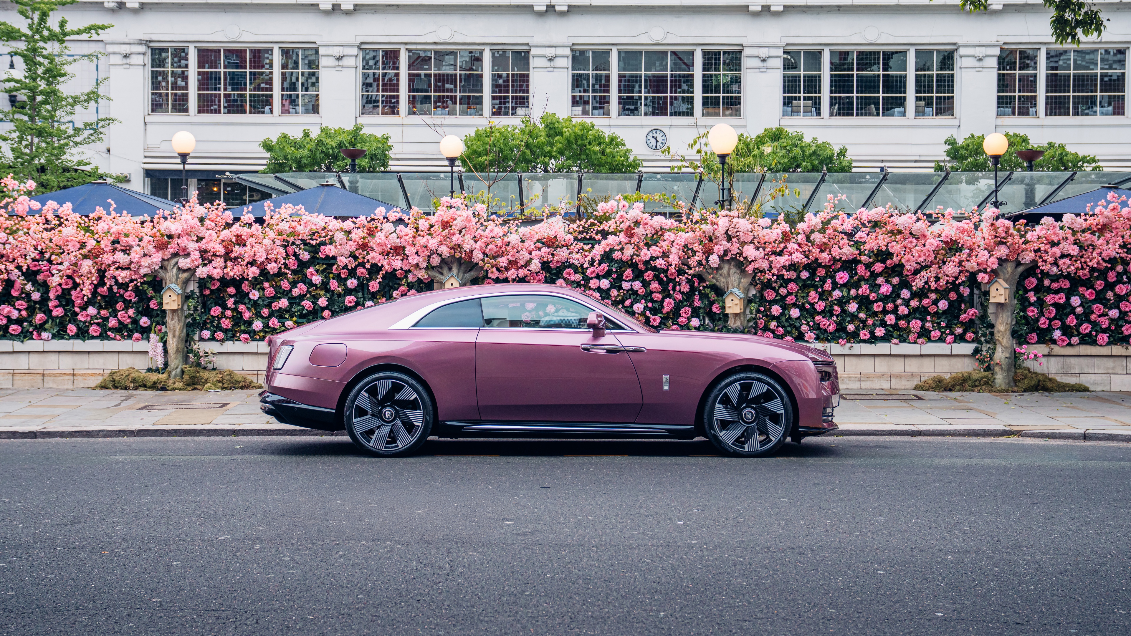 A high-resolution, detailed view of a luxurious Rolls-Royce Spectre electric vehicle showcasing its modern design.