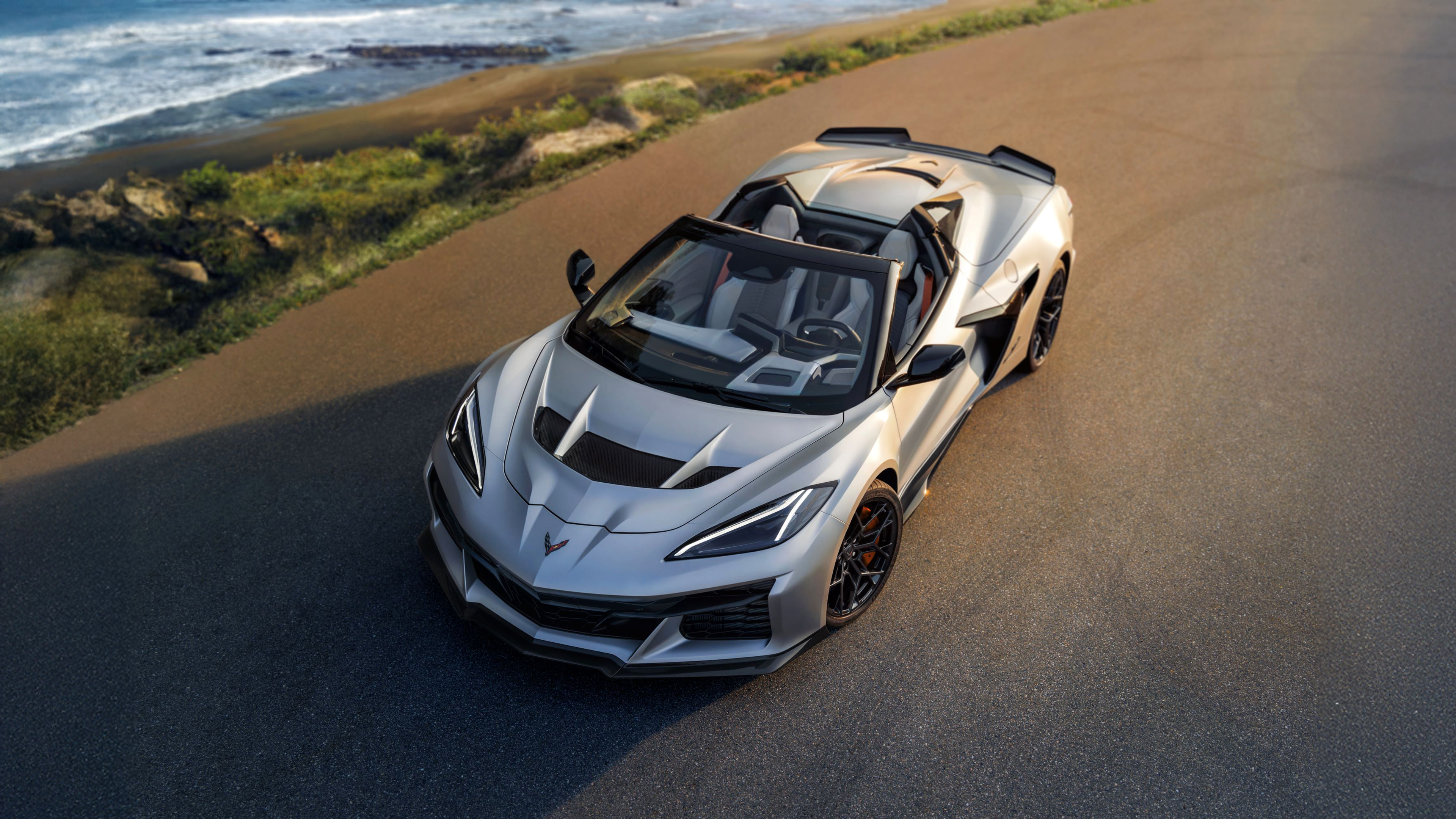 A futuristic and aerodynamic 2026 Chevrolet Corvette ZR1X limited edition supercar with a sleek, high-performance design.