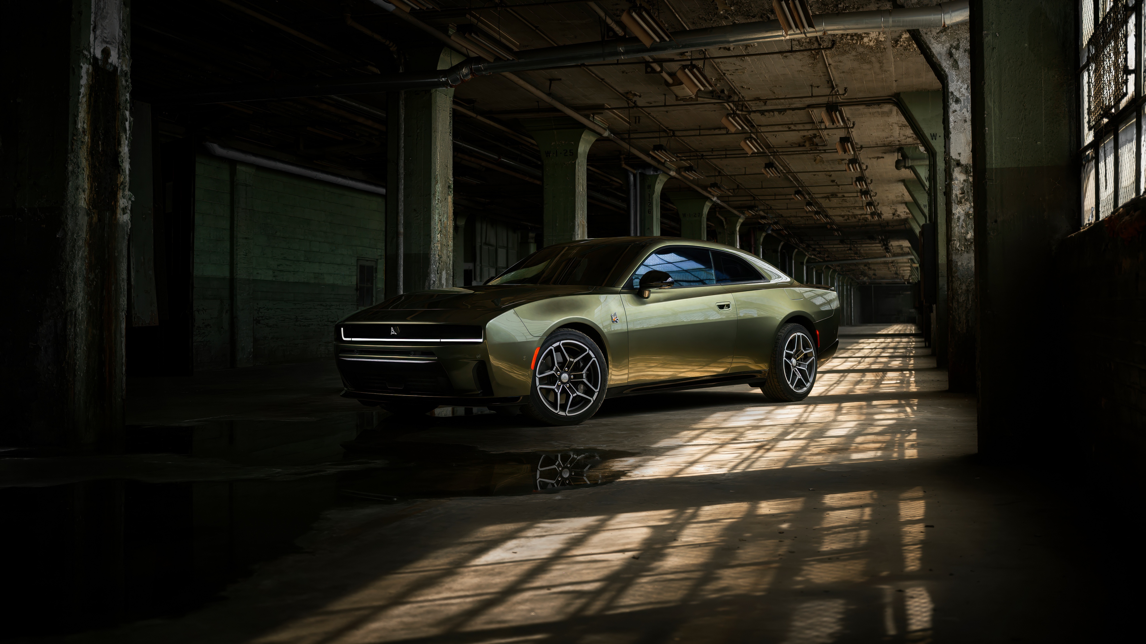 Close-up view of the 2026 Dodge Charger Daytona Scat Pack featuring sleek, modern muscle car styling.