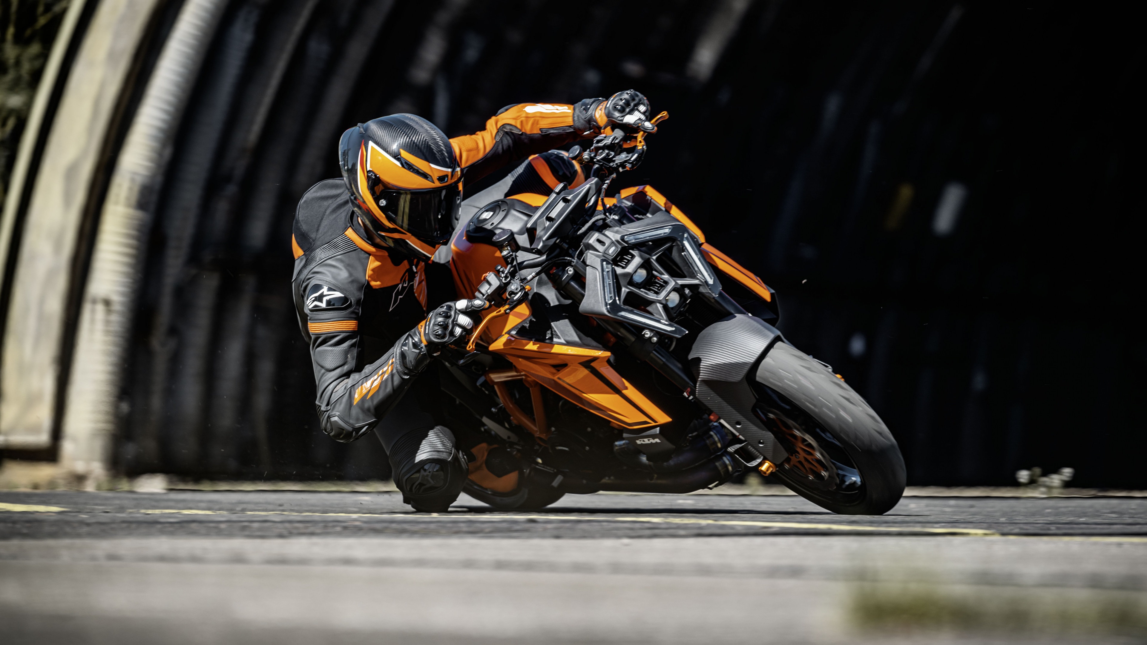 A detailed view of the 2024 KTM 1390 Super Duke R racing motorcycle.