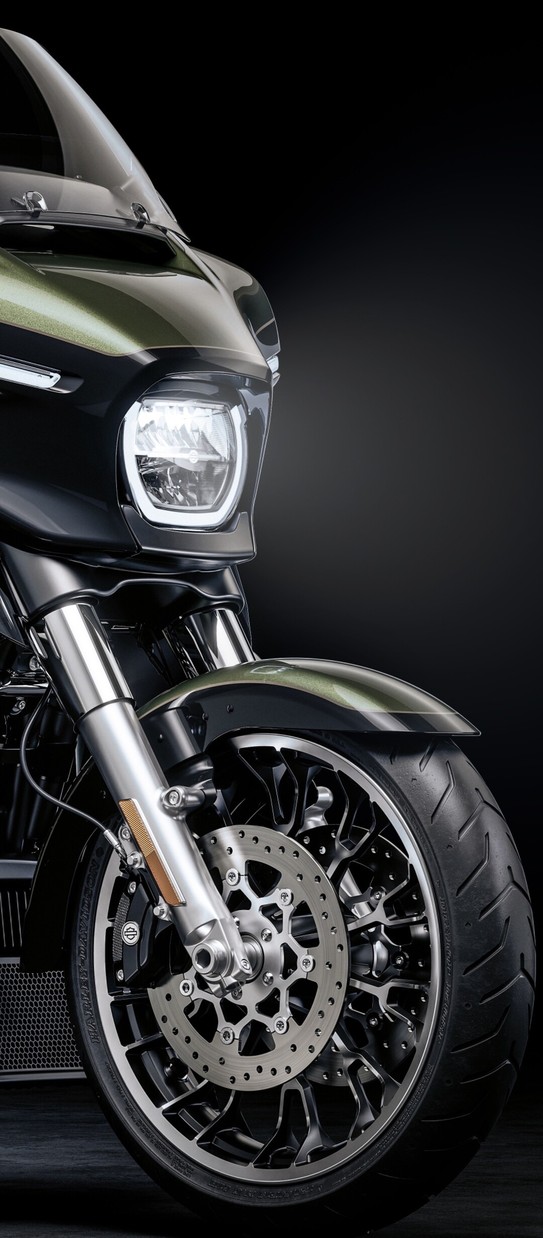 A high-detail view of a 2026 Harley-Davidson Street Glide cruiser motorcycle set against a dark, atmospheric background.