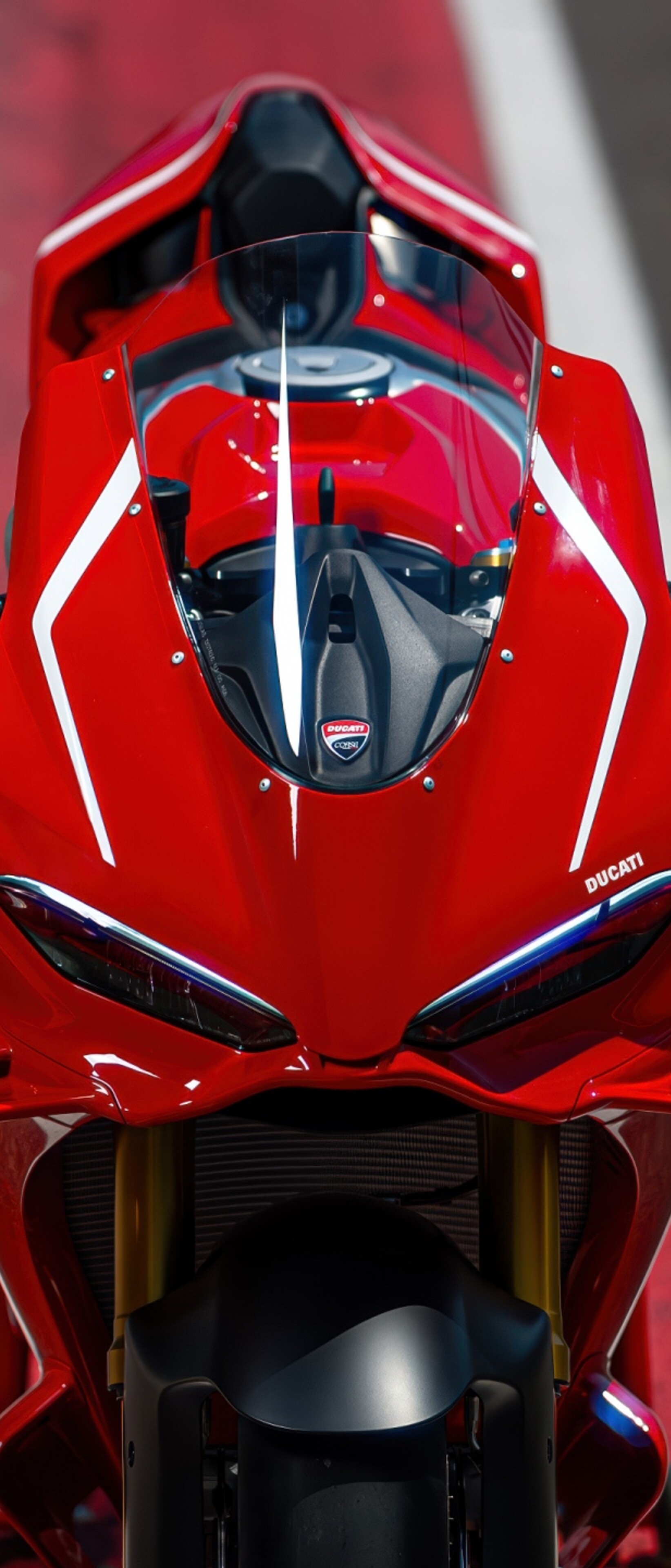 A sleek, red 2026 Ducati Panigale V4 R sports motorcycle in high detail.