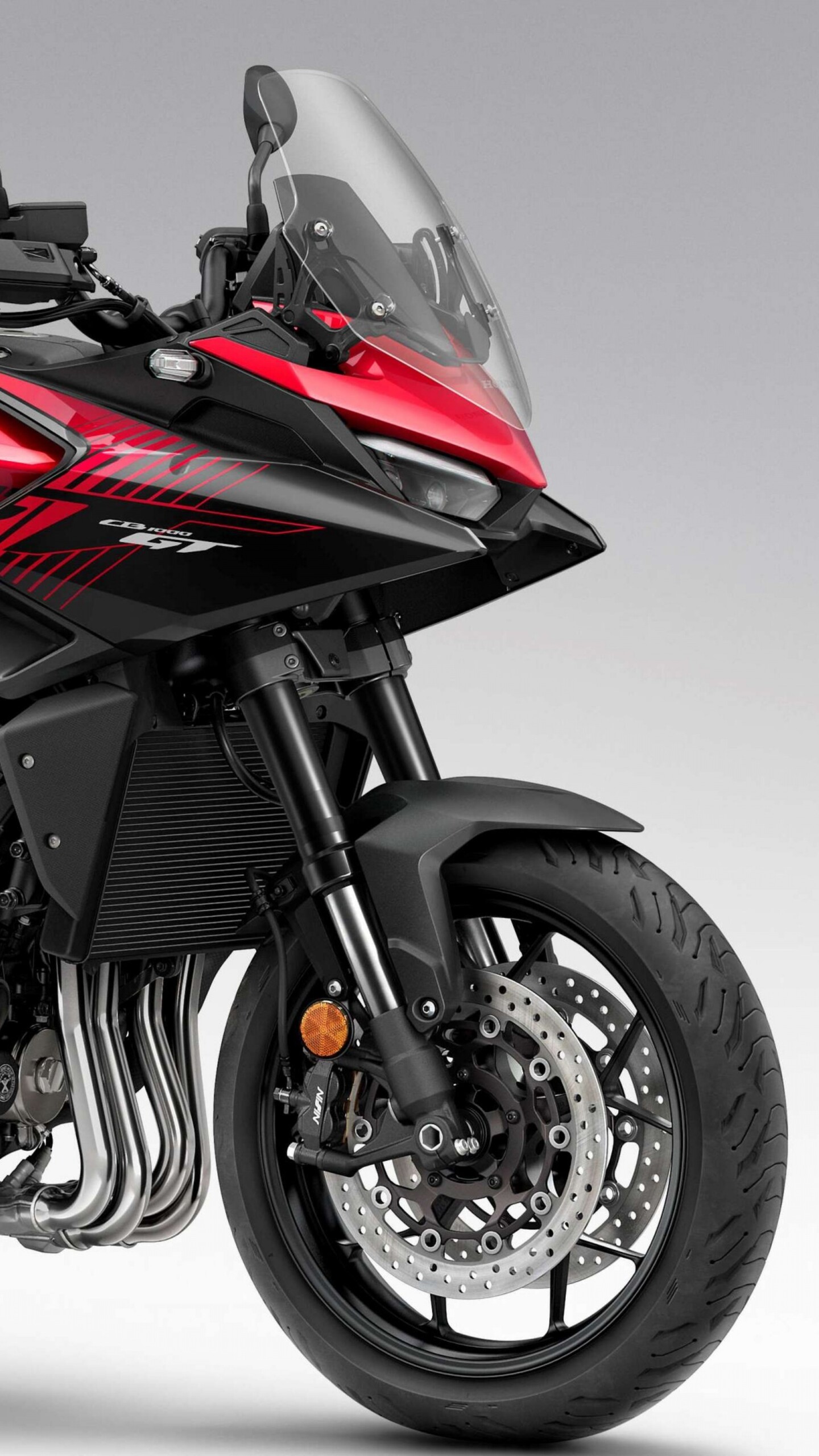 A high-resolution, cinematic view of the futuristic 2026 Honda CB1000GT touring motorcycle.