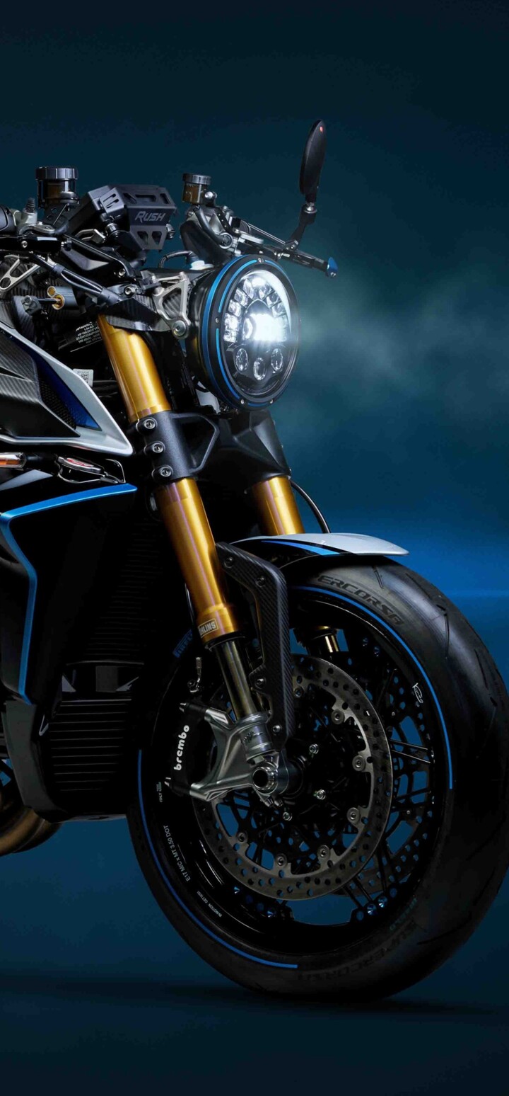 A sleek, dark blue 2026 MV Agusta Rush Titanio naked motorcycle with high-end finishes.